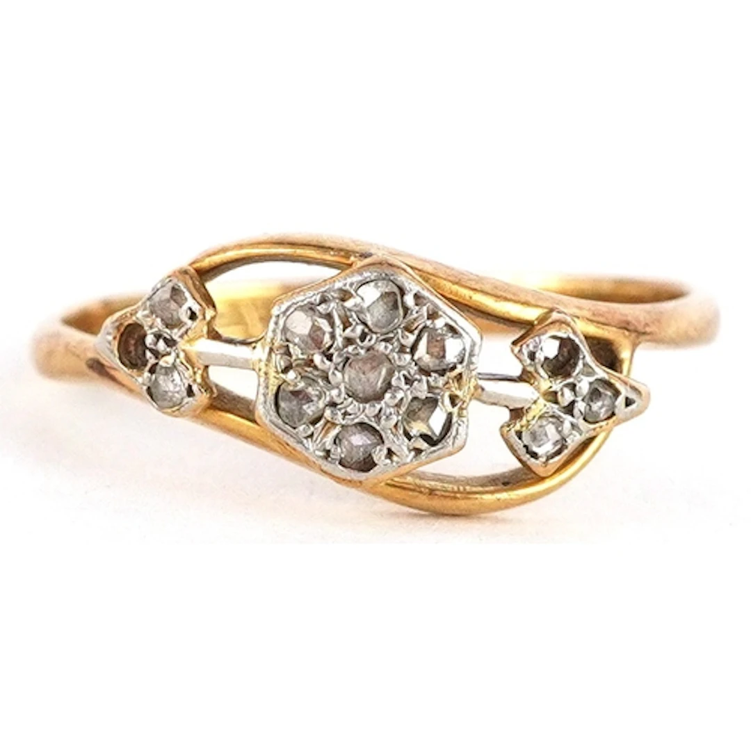 18ct gold and platinum diamond crossover ring, size M, 1.8g.