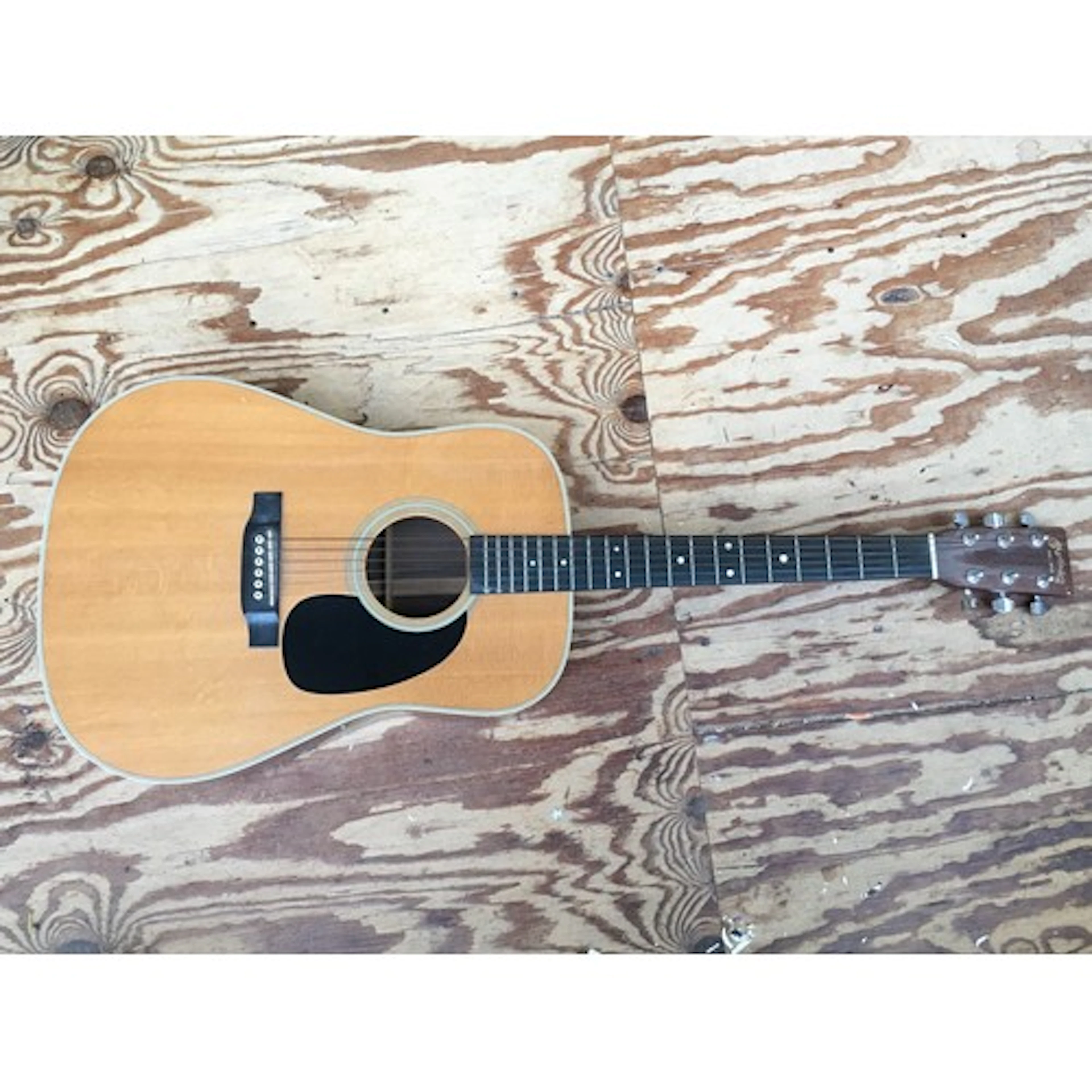 A 2003 Martin D28 acoustic guitar, serial number 968212. Com...