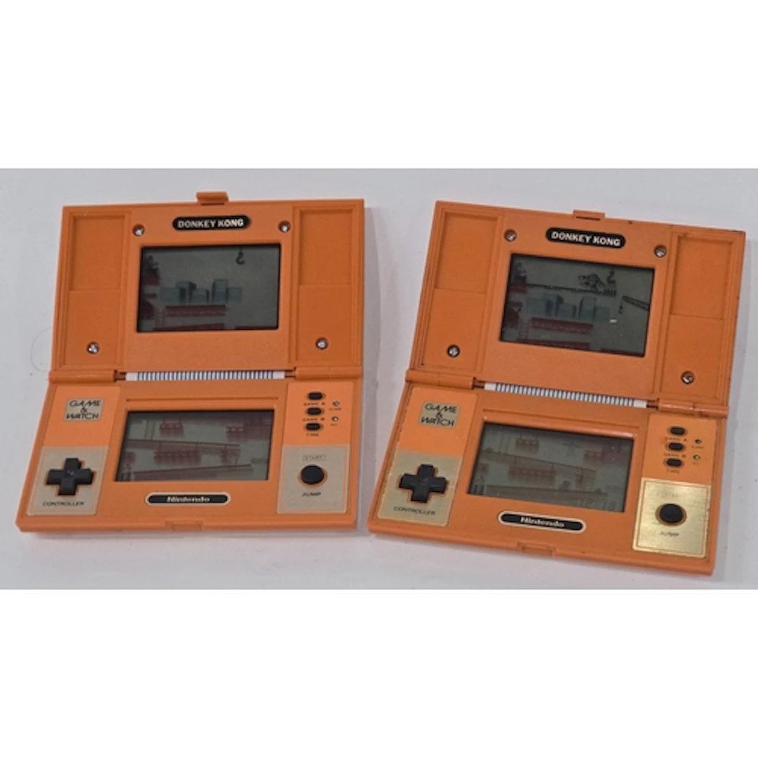 Two vintage Nintendo Game & Watch Donkey Kong handheld elect...
