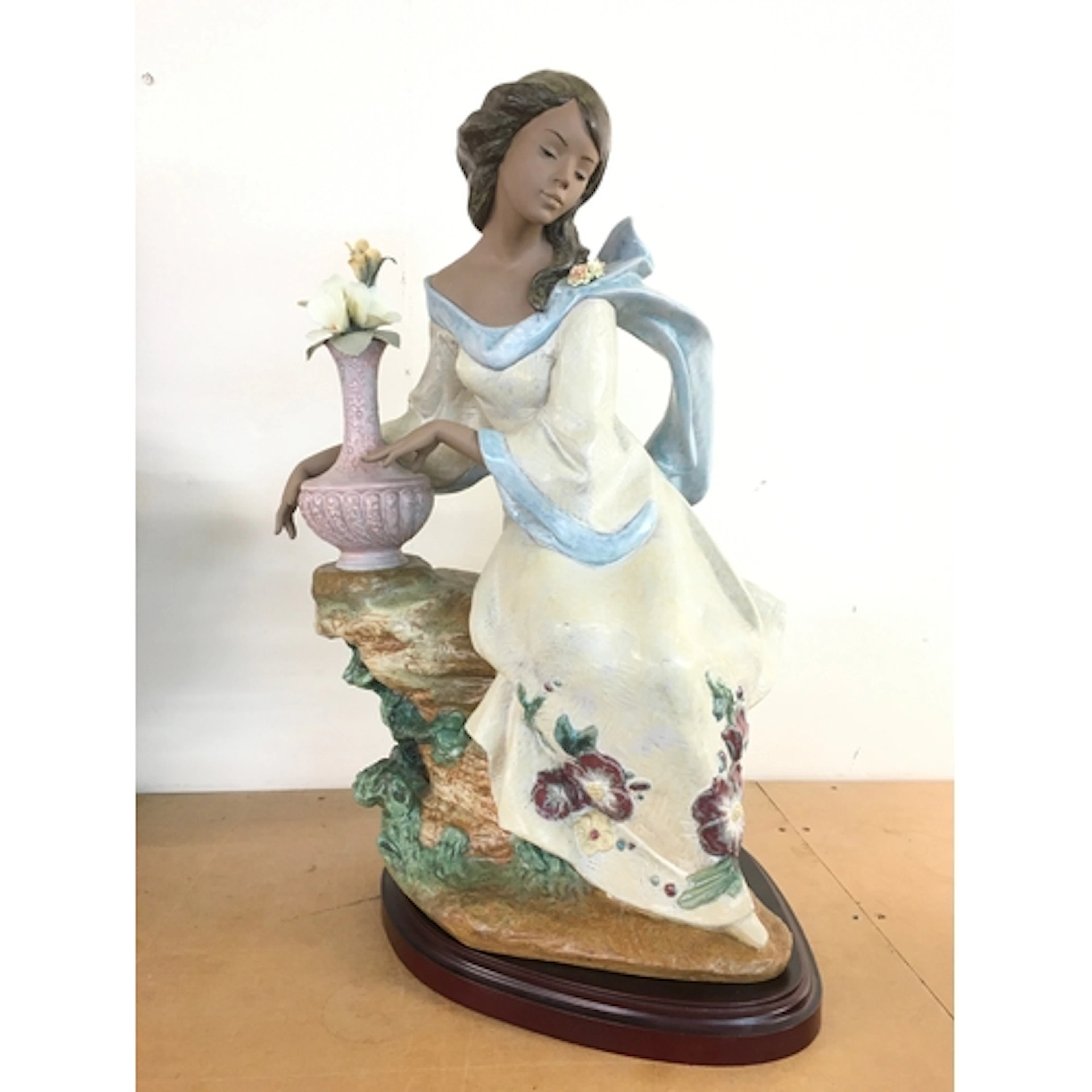 A Lladro Garden Breeze figure, 60cm tall. No obvious damage ...