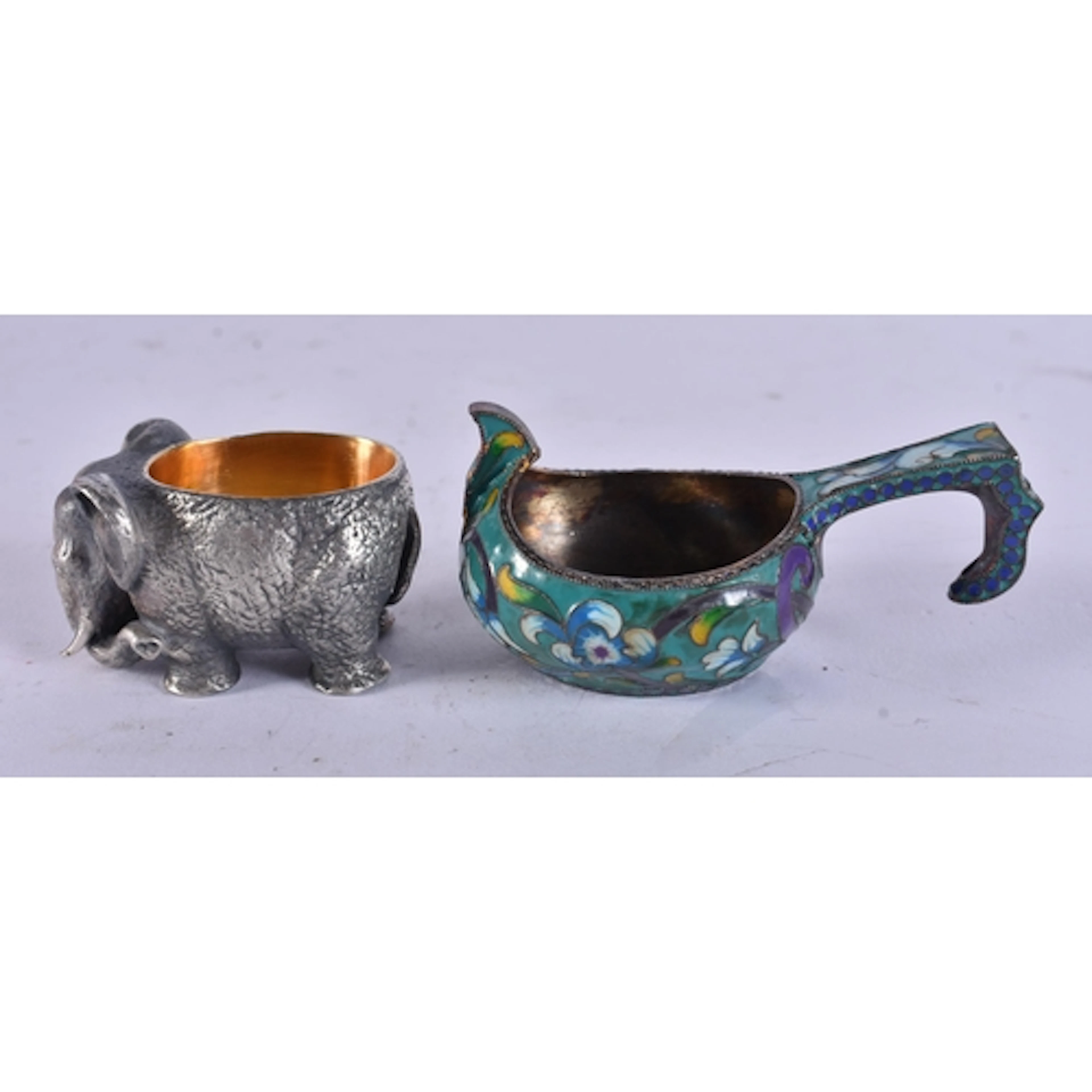 AN ANTIQUE MINIATURE RUSSIAN KOVSH together with a silver el...