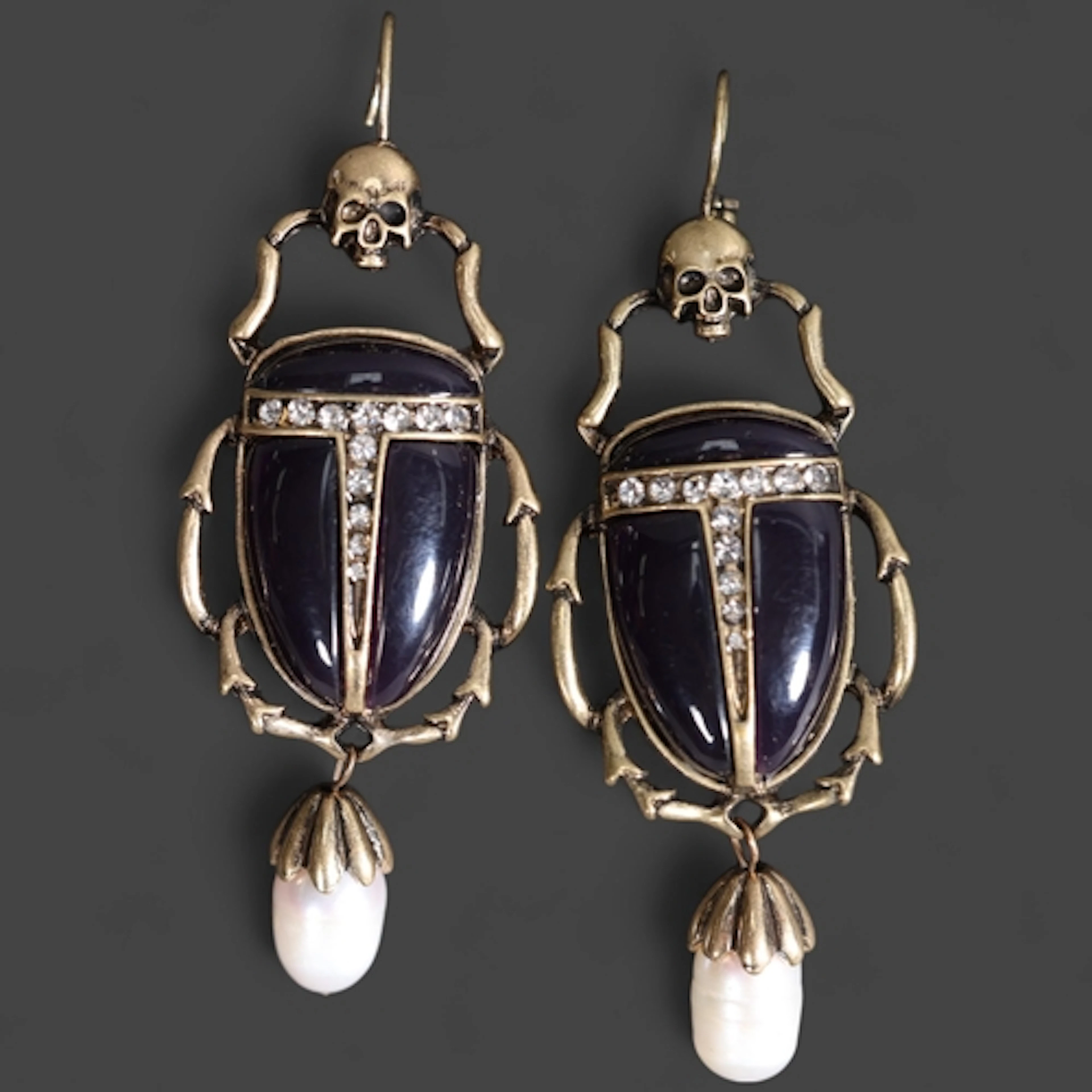 Jewellery: Alexander McQueen style costume jewellery earring...