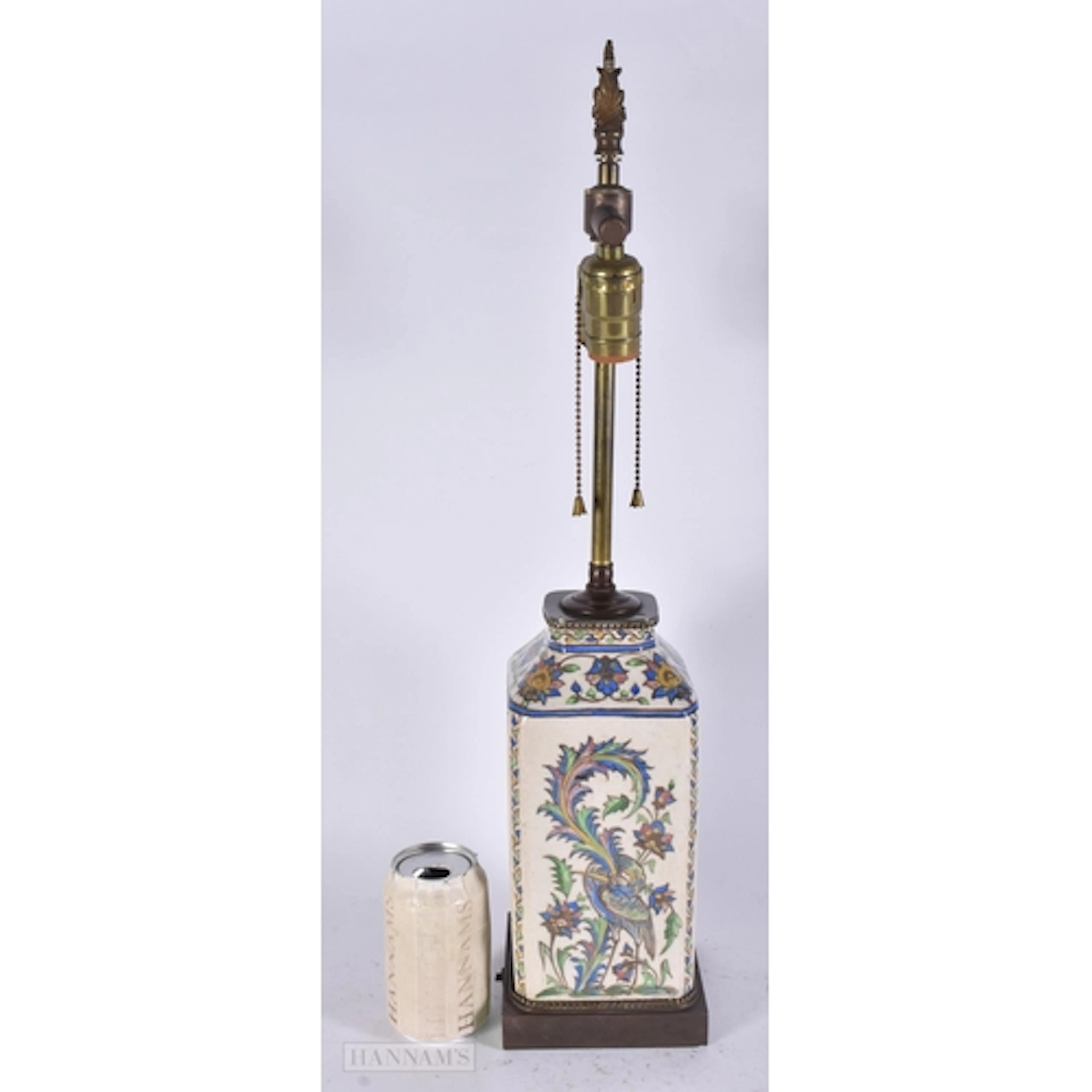 AN ANTIQUE PERSIAN QAJAR POTTERY LAMP painted with figures. ...