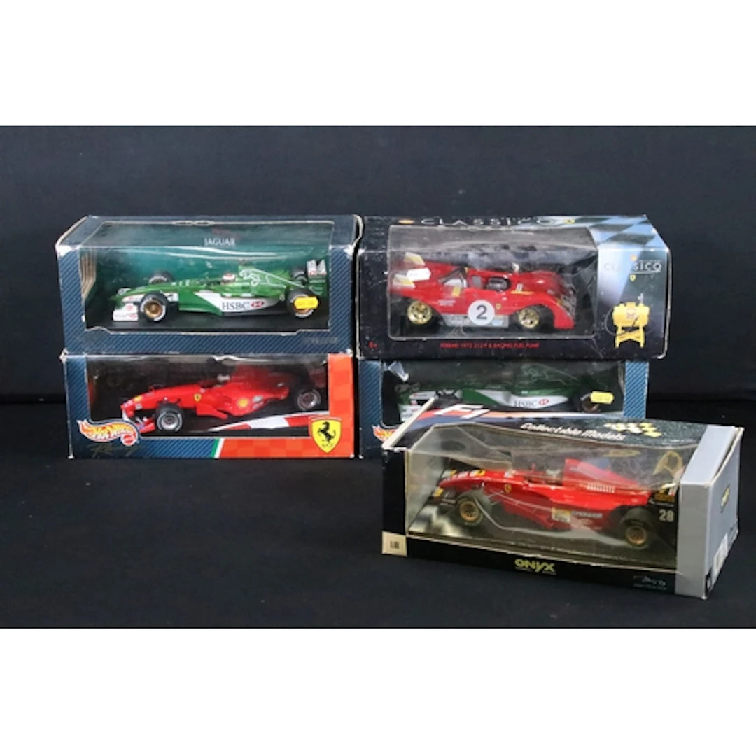 Five boxed 1/18 racing diecast models to include 3 x Mattel ...