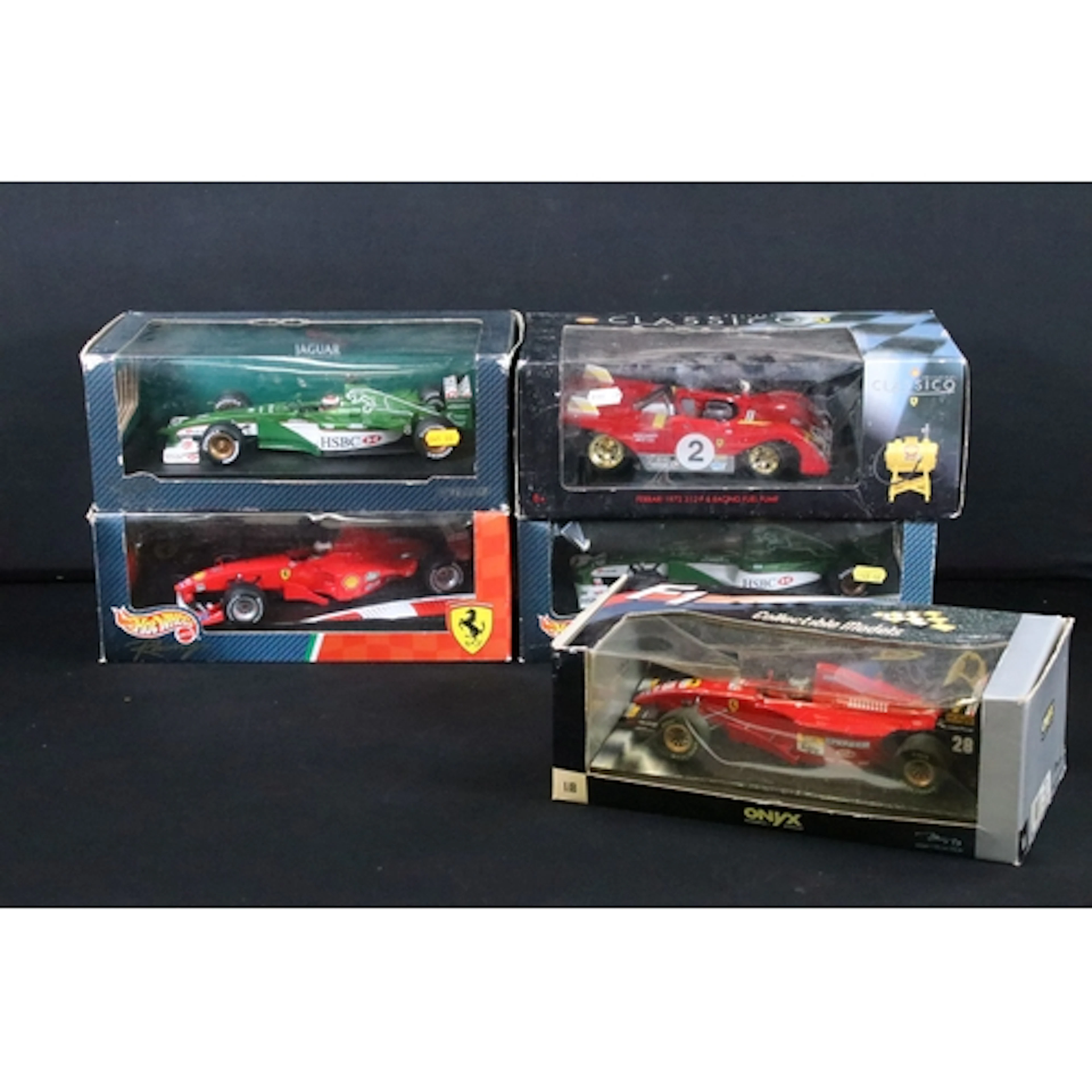 Five boxed 1/18 racing diecast models to include 3 x Mattel ...