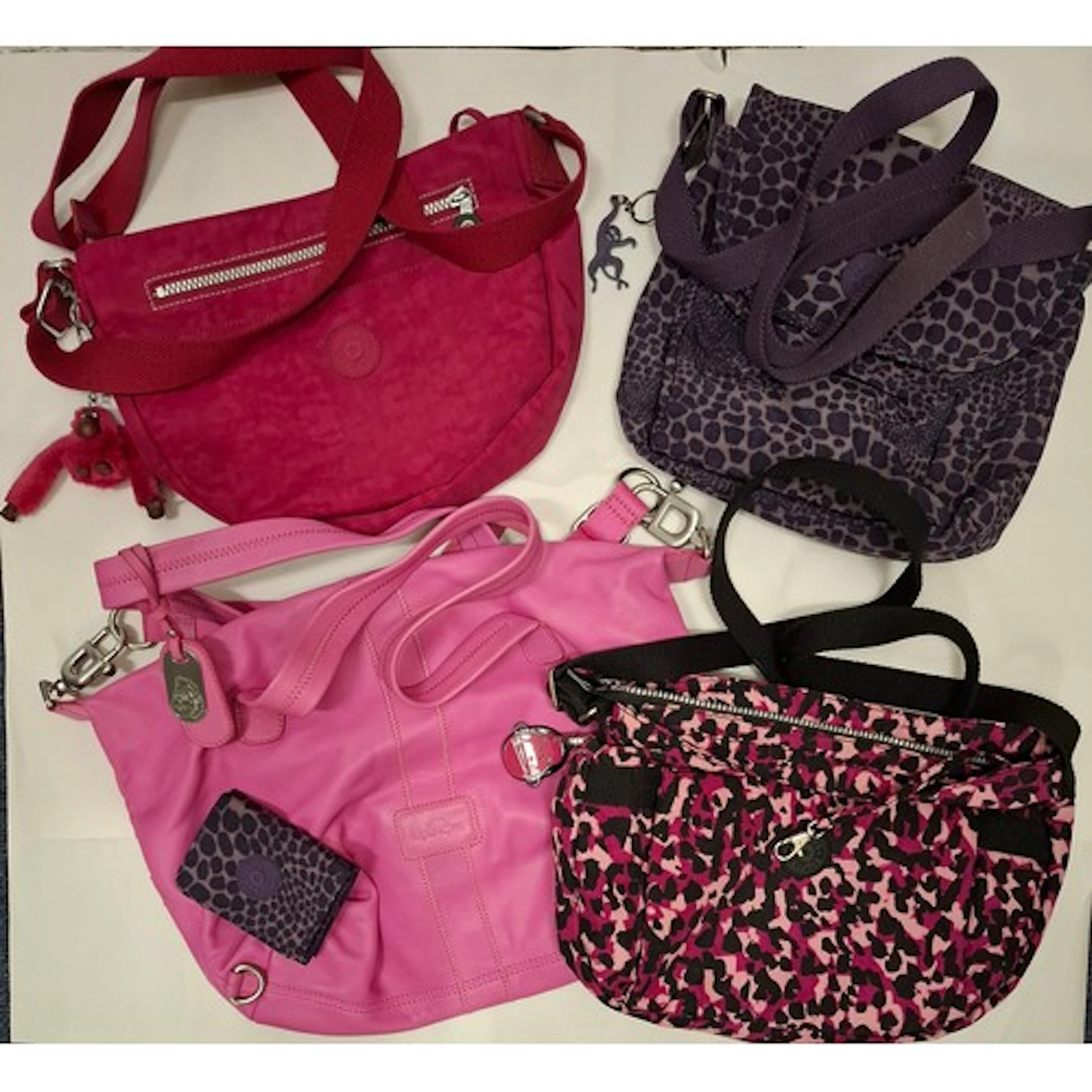 Kipling-Four mixed bags, a small purse and 1 faux fur monkey...