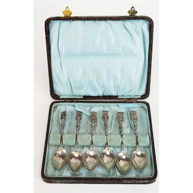 A French set of silver souvenir armorial spoons, stamped for...