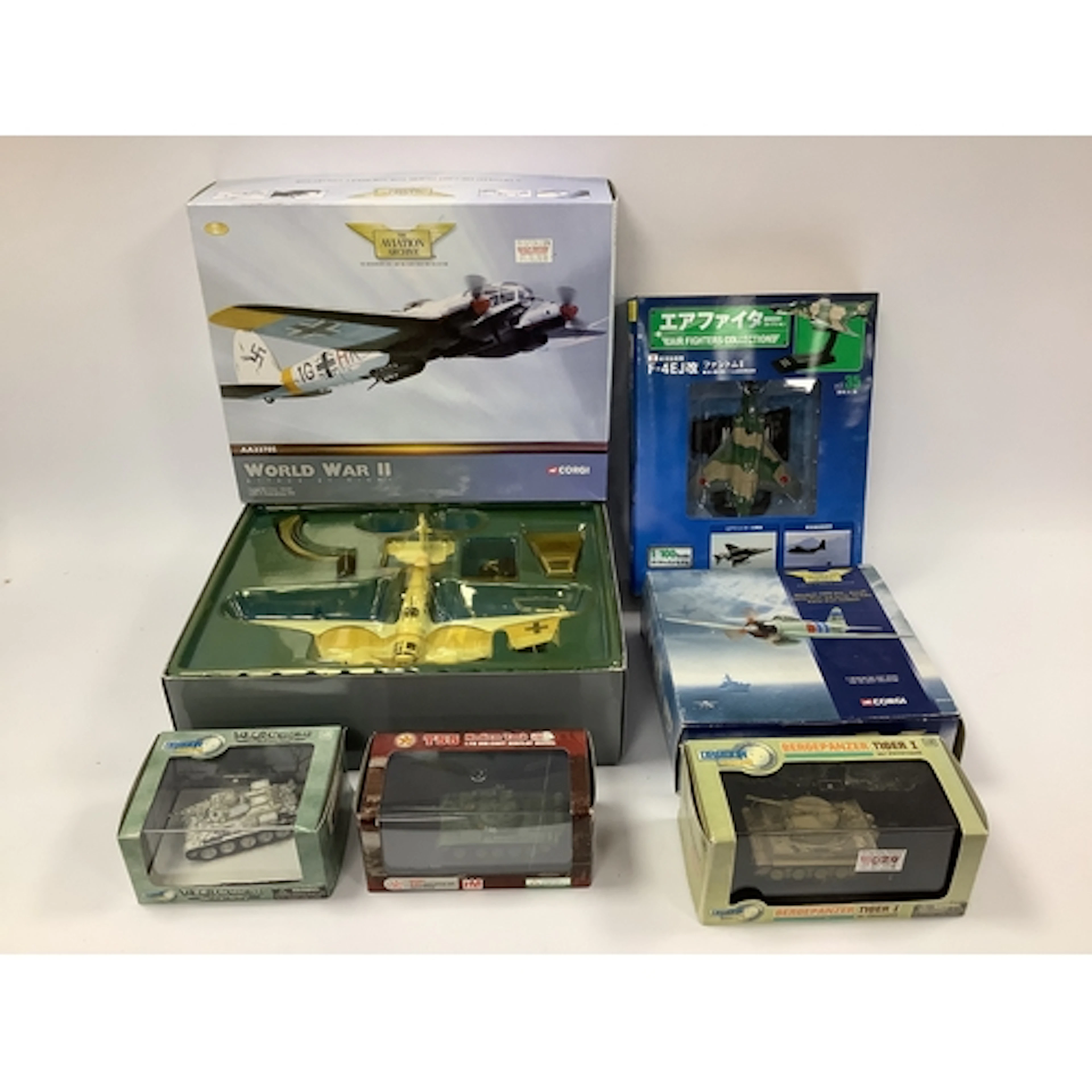 Six 1:72 and 1:100 Diecast military tanks and planes by Corg...
