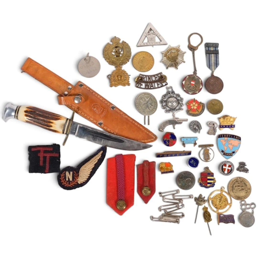 A group of various items, including a horn-handled bowie kni...
