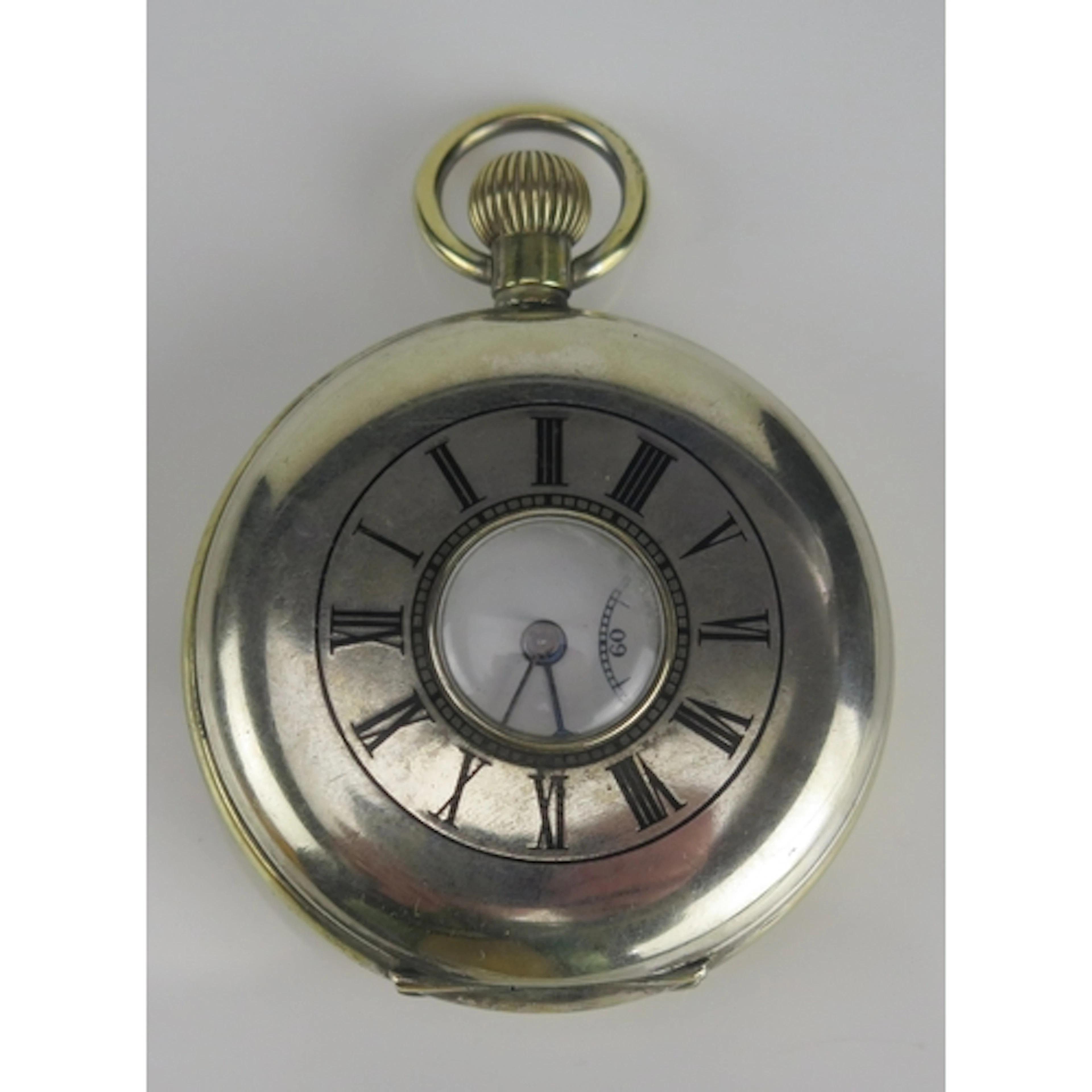 A Medana half hunter keyless pocket watch, 52mm case. Winds,...