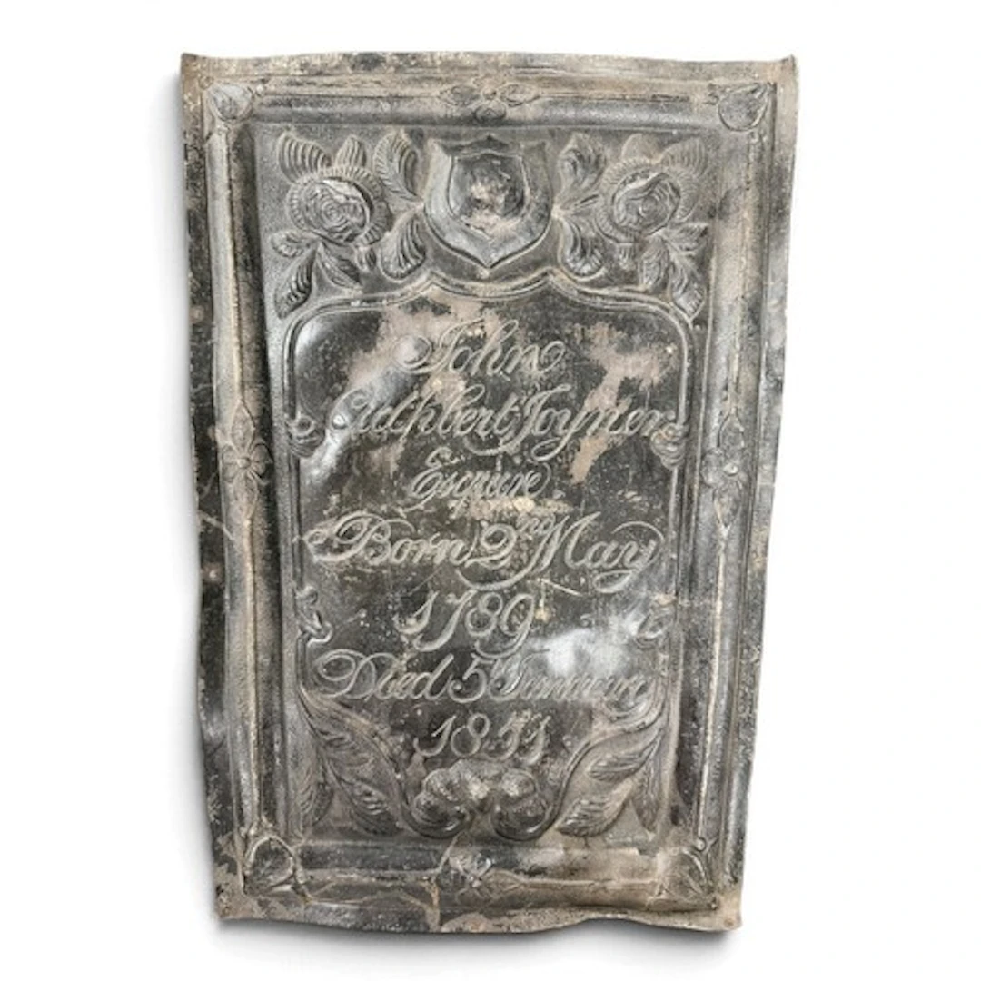 A large Victorian lead coffin plaque, inscribed John Cuthber...