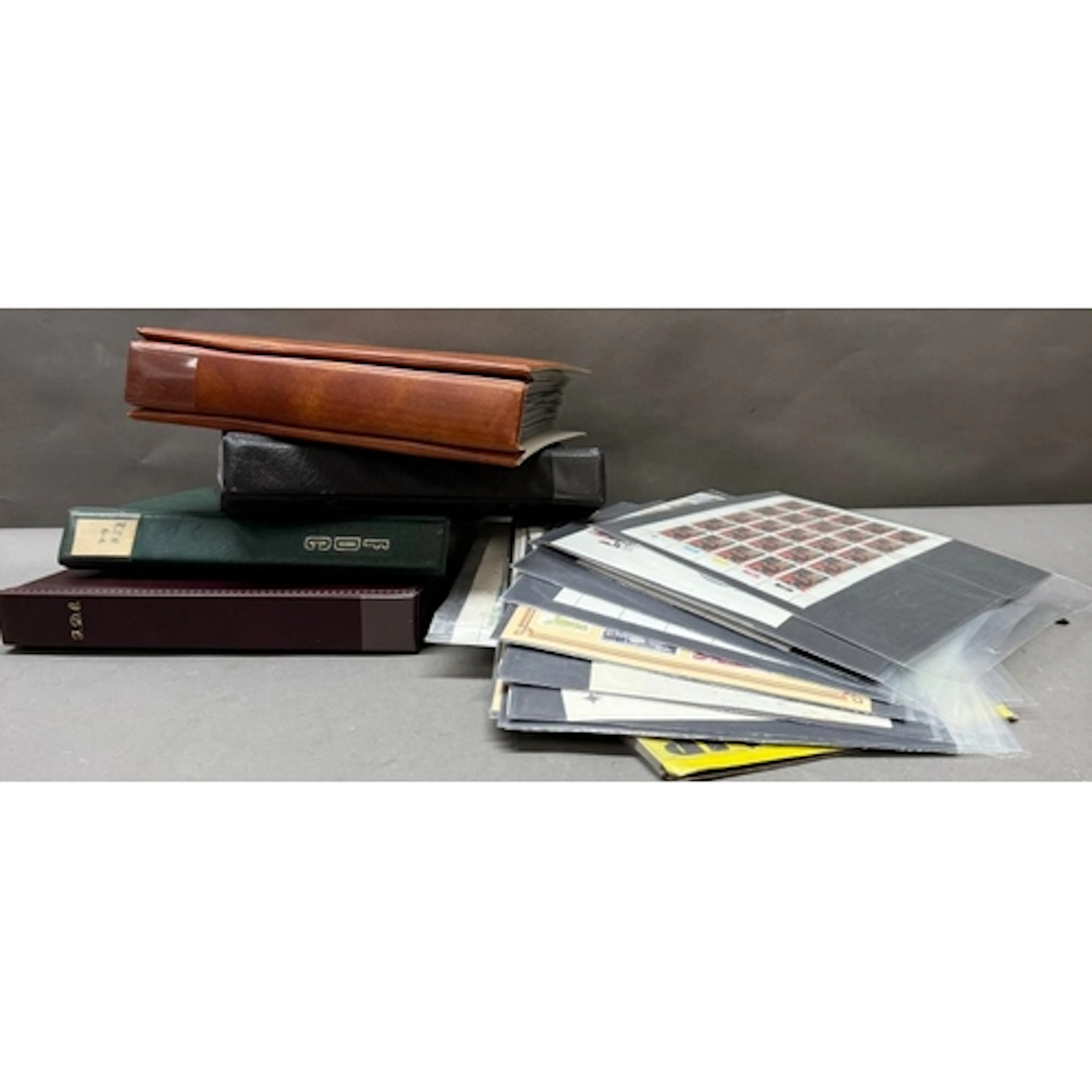 A quantity of stamp sheets and first day covers. Various den...