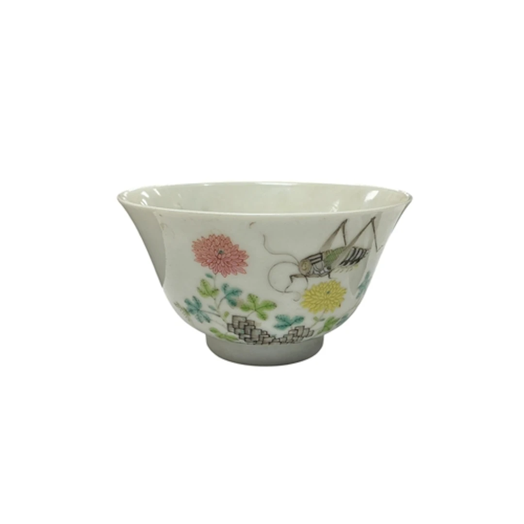 A Chinese famille rose grasshopper and chrysanthemum bowl, R...
