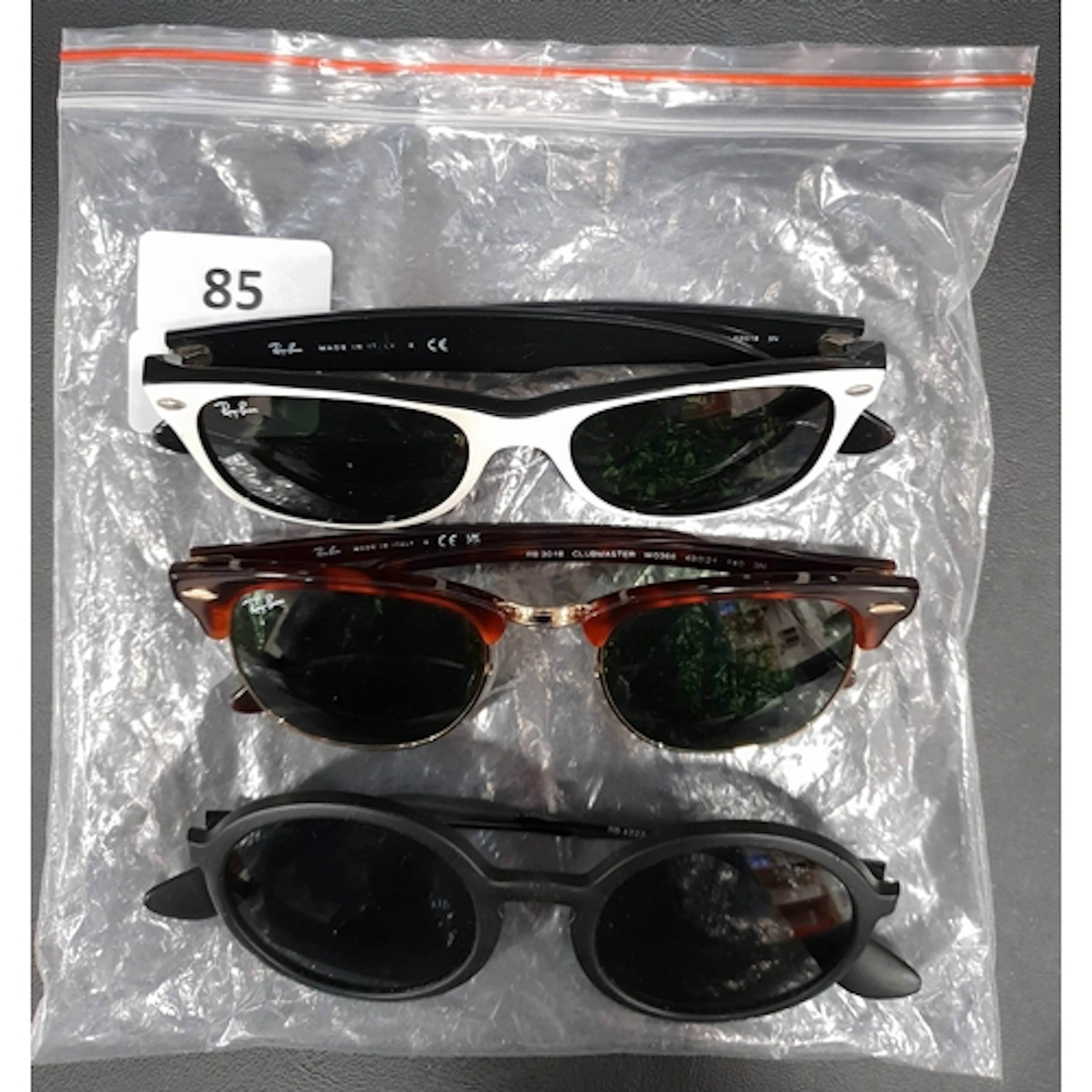 THREE PAIRS OF RAY-BAN SUNGLASSES Comprising models RB2132, ...