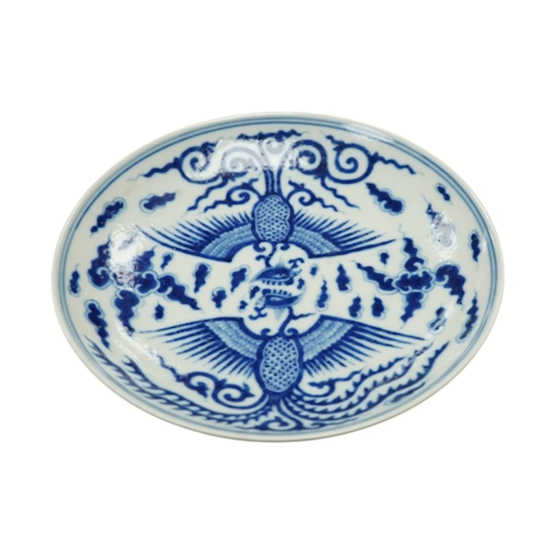 A Chinese blue and white porcelain saucer dish, decorated wi...