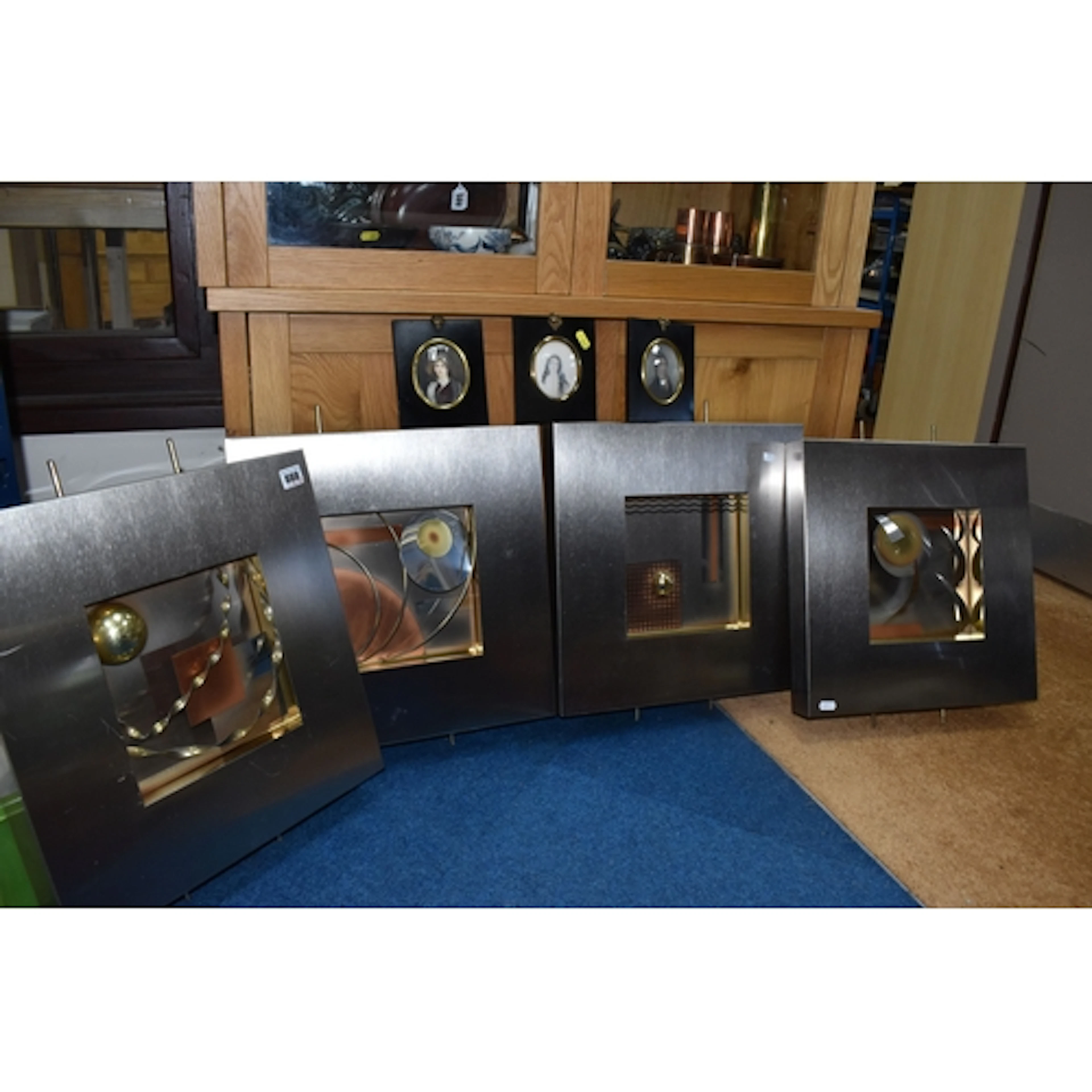 FOUR METAL WALL ART SCULPTURES IN THE STYLE OF CURTIS JERE, ...