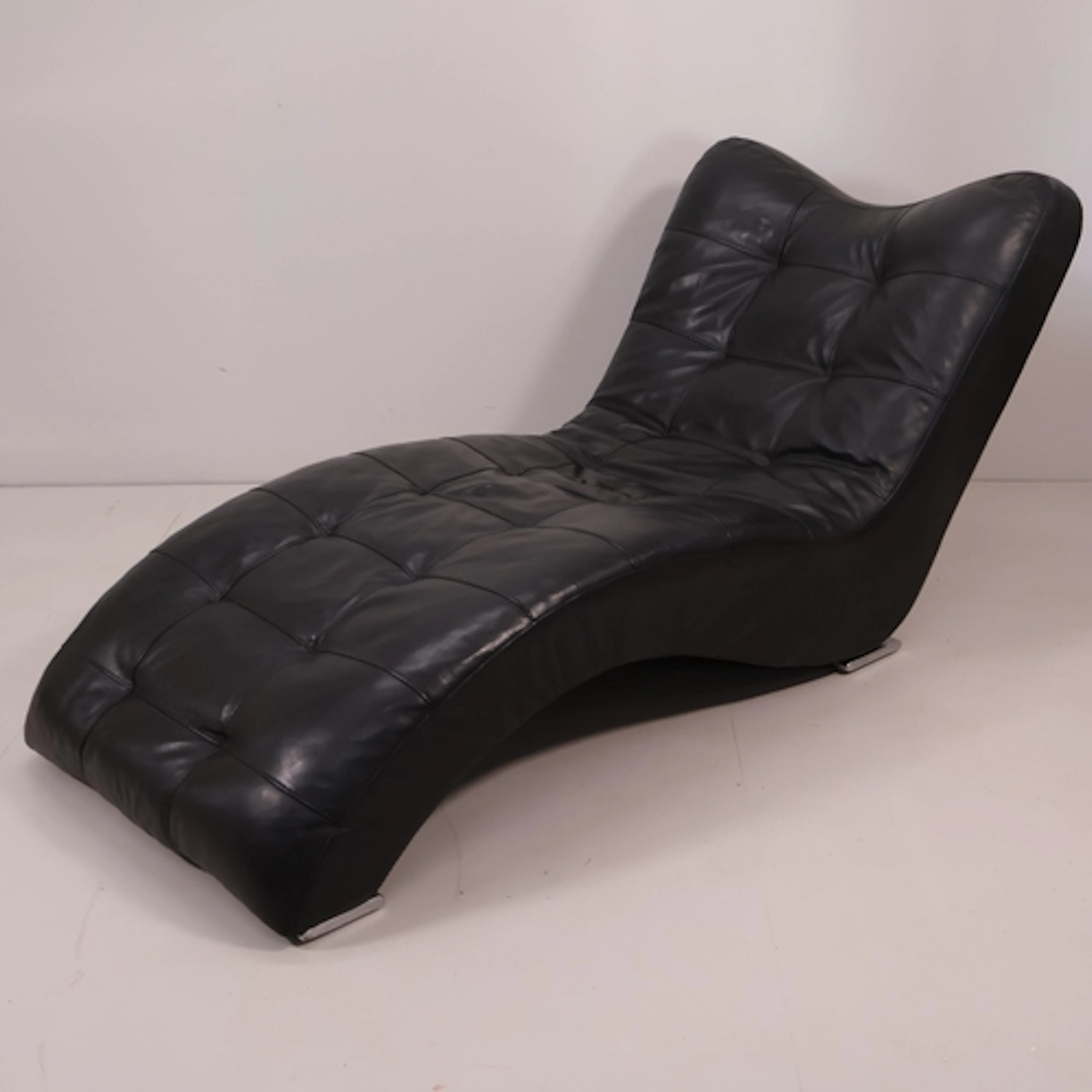 A Rare 1970's Contempo Leather Chaise Lounge, As part of the...