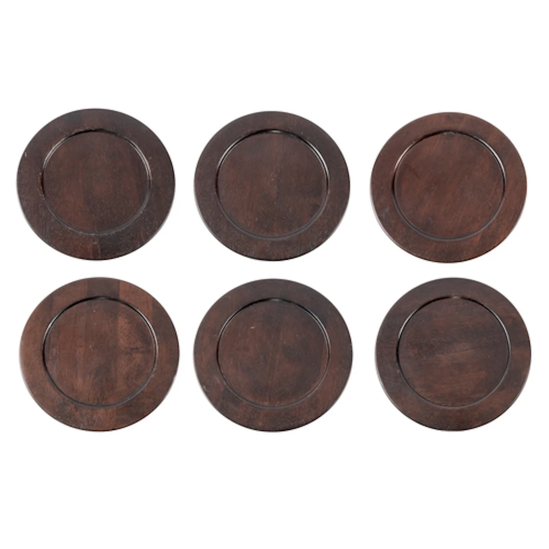 A set of six dark stained oak trenchers, 20th century; of ci...