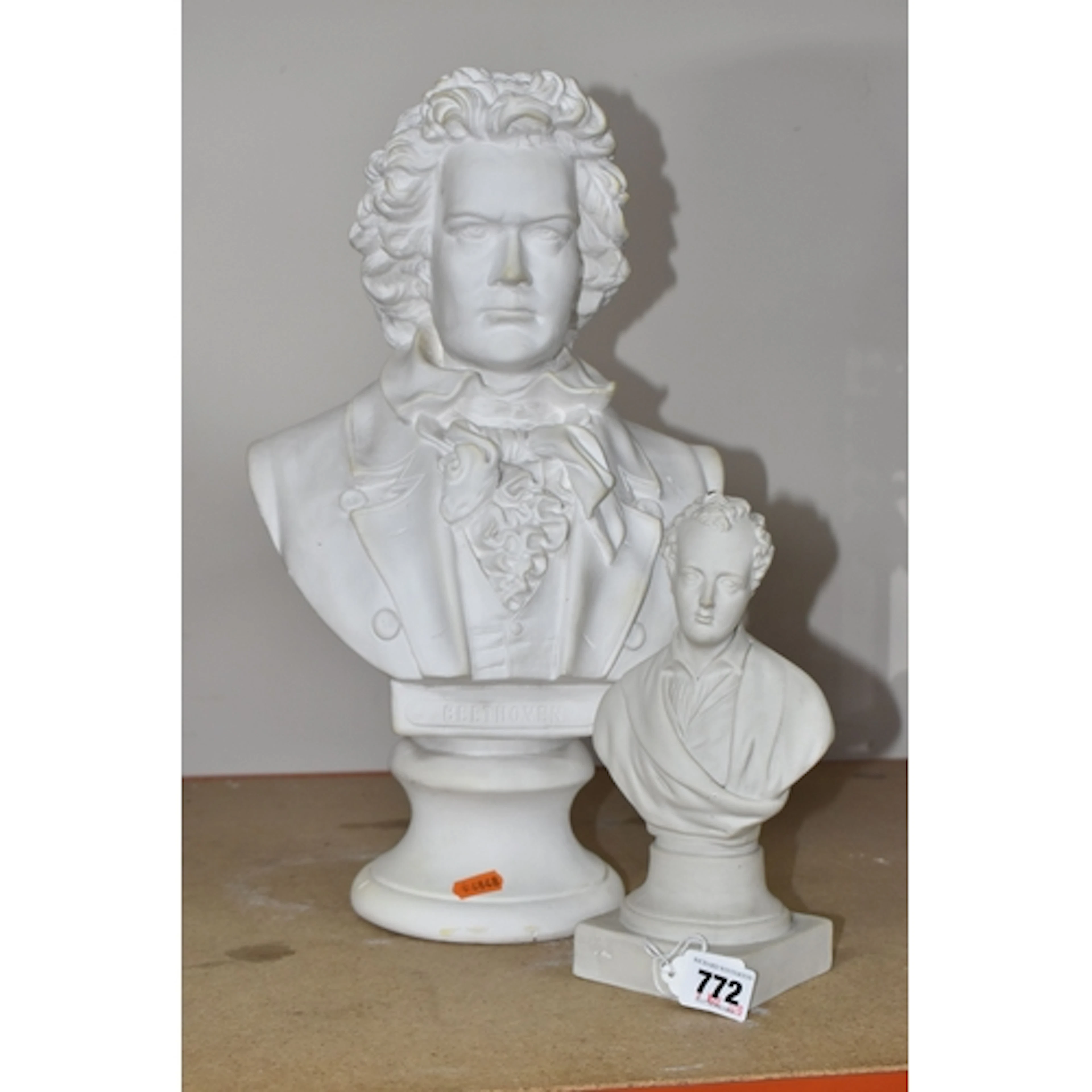 TWO BUSTS OF HISTORICAL FIGURES comprising a large plaster b...
