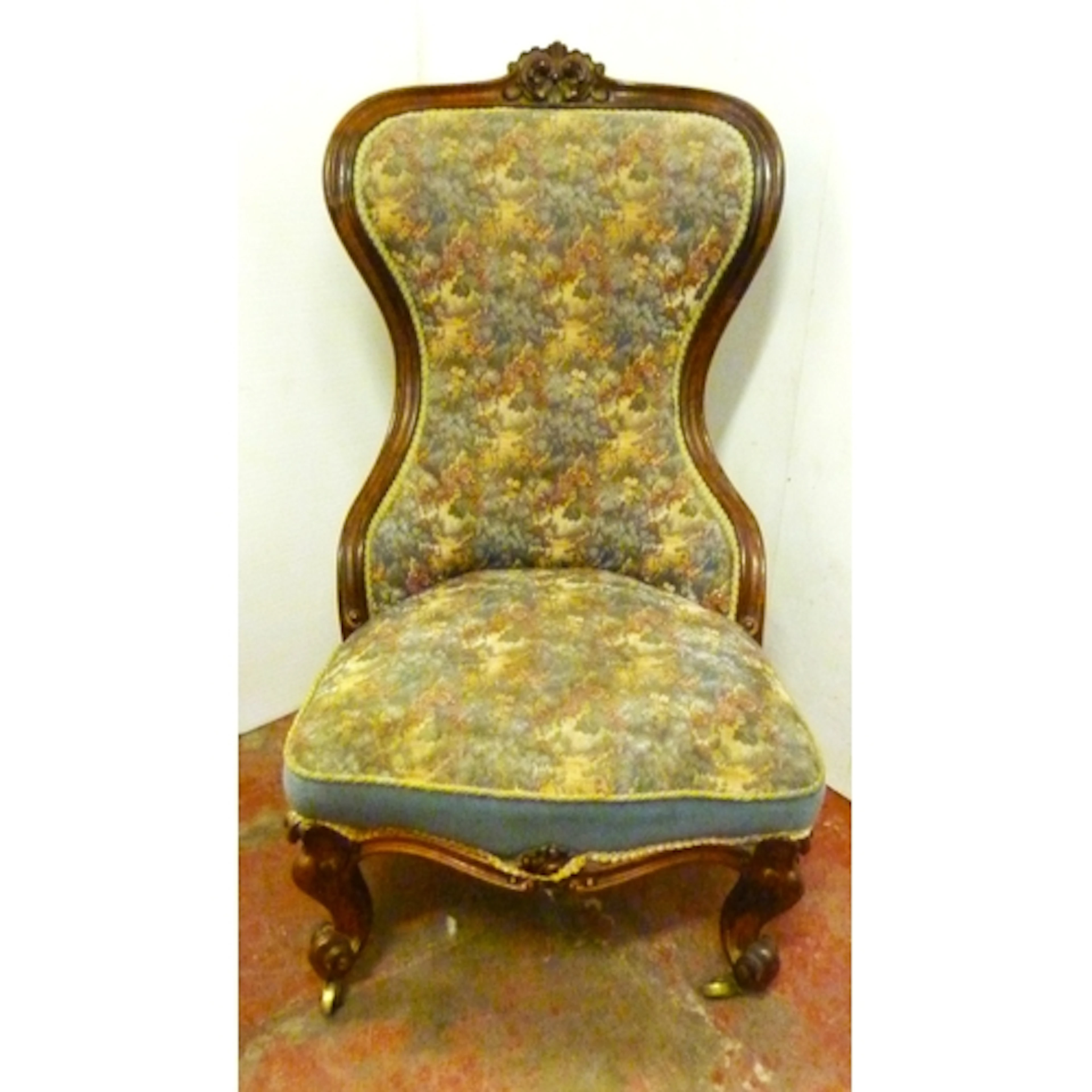Late Victorian walnut framed and later floral stuff over uph...