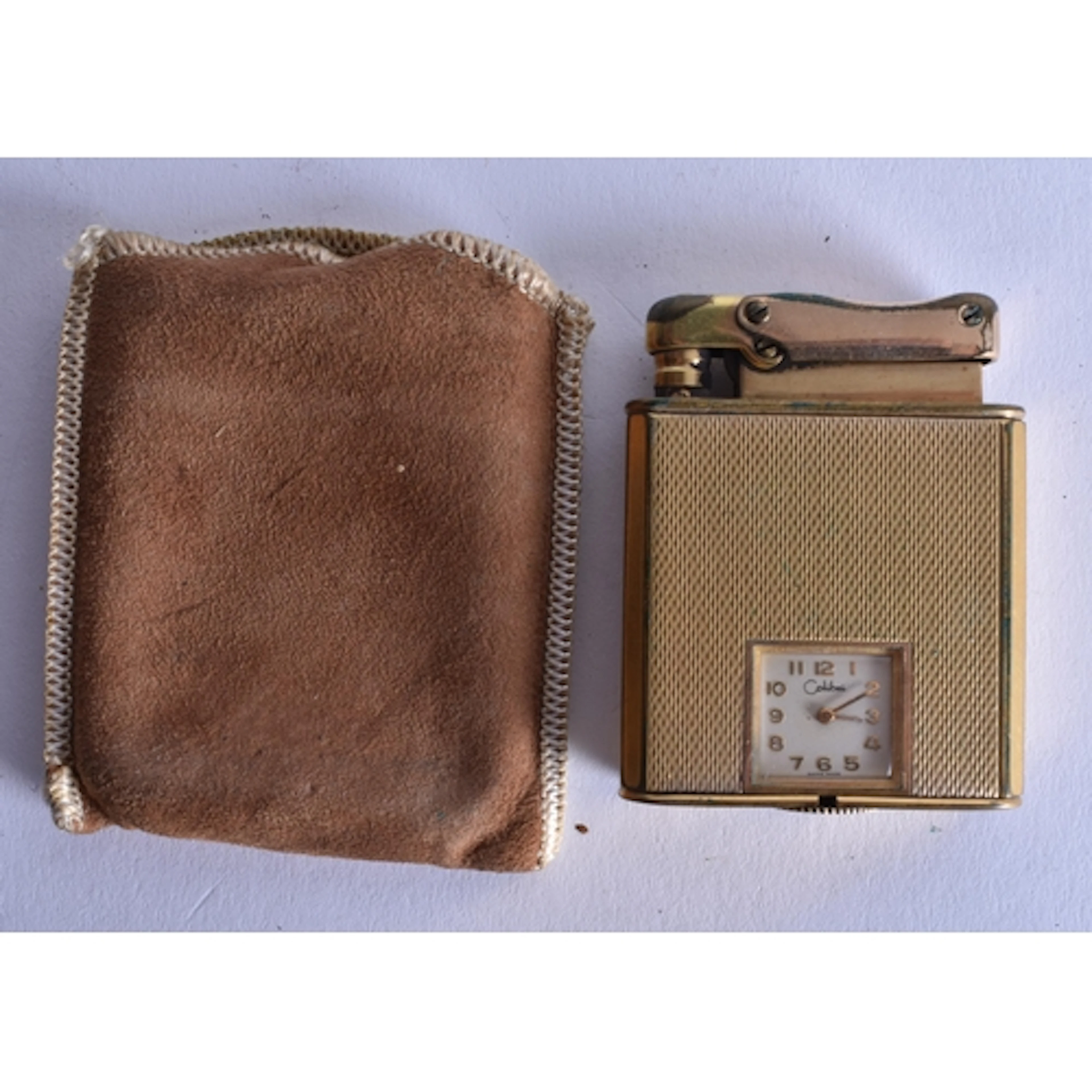 A COLIBRI LIGHTER WATCH. 5.25 cm x 4 cm.