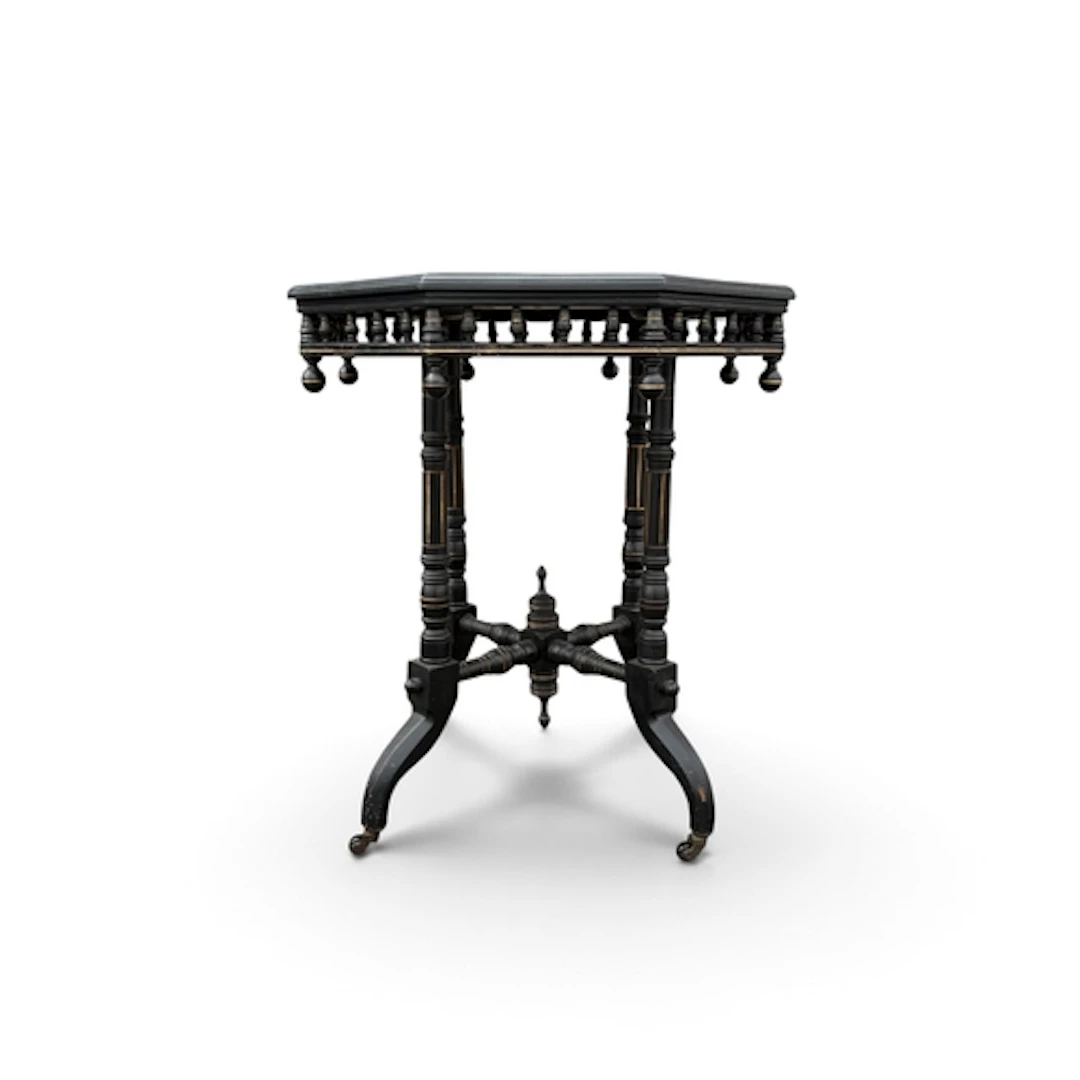 AN AESTHETIC PERIOD EBONISED OCTAGONAL TOP TABLE The turned ...