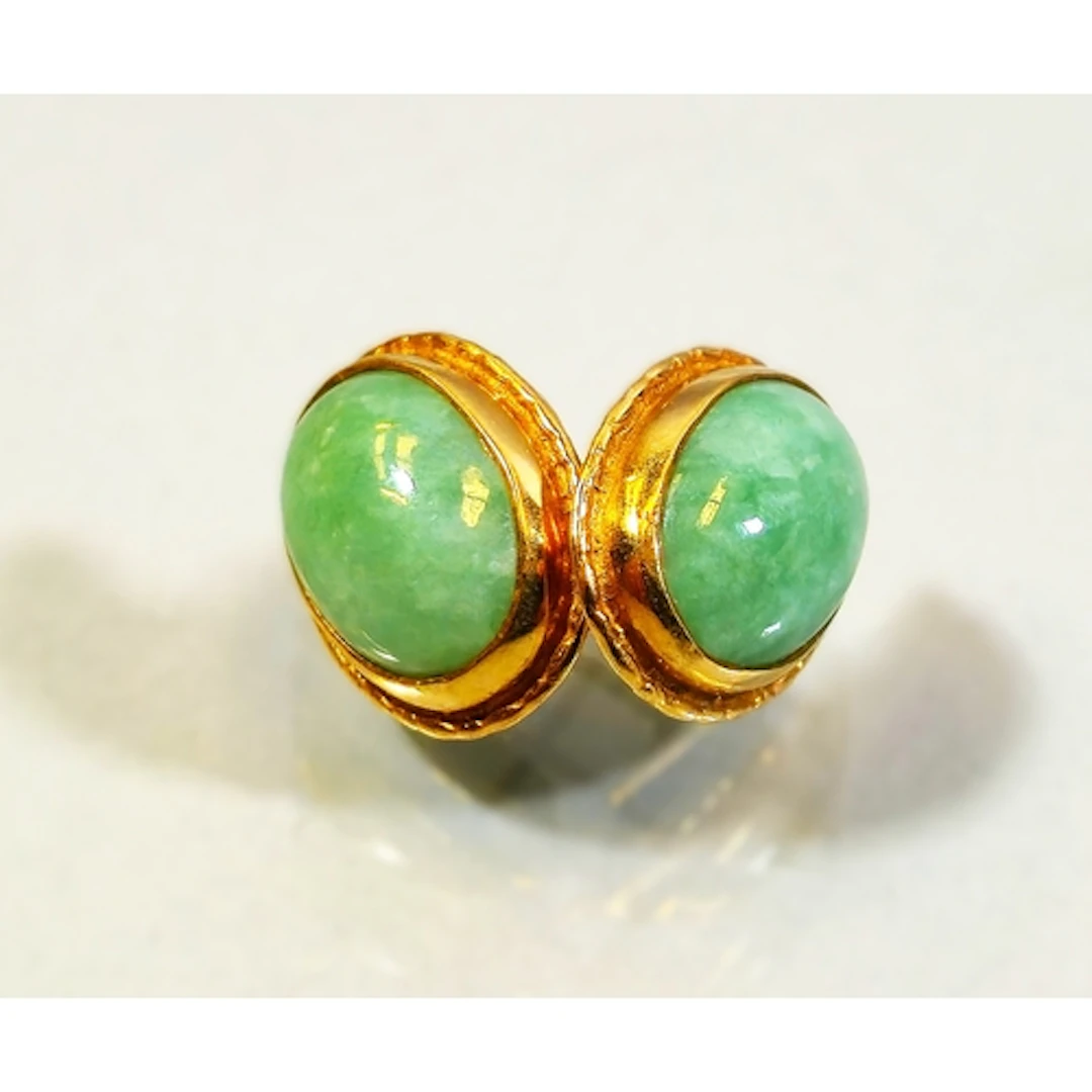 Pair of 9ct gold and green jade earrings, set with a raised ...