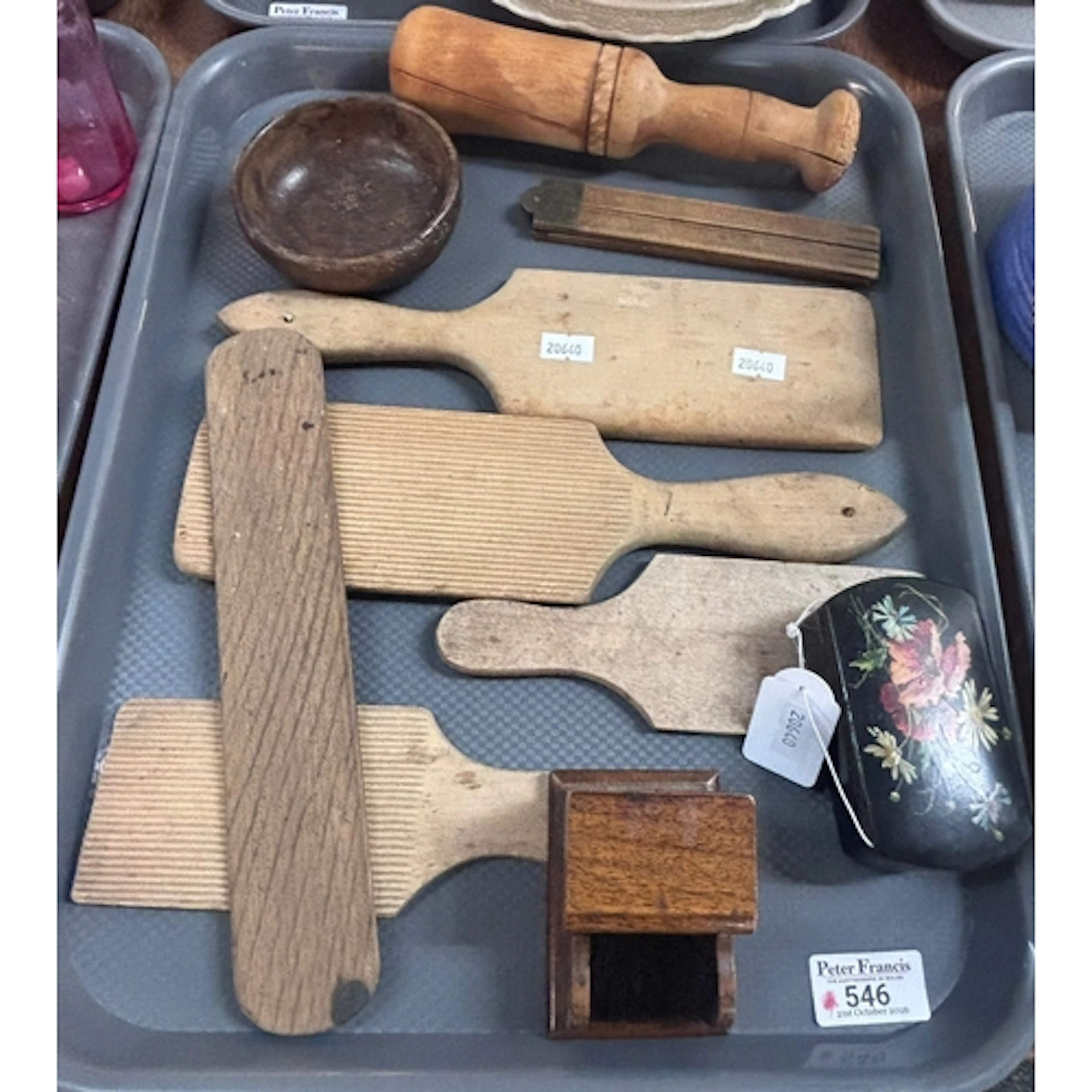 Tray of treen, to include butter pats, folding ruler with br...