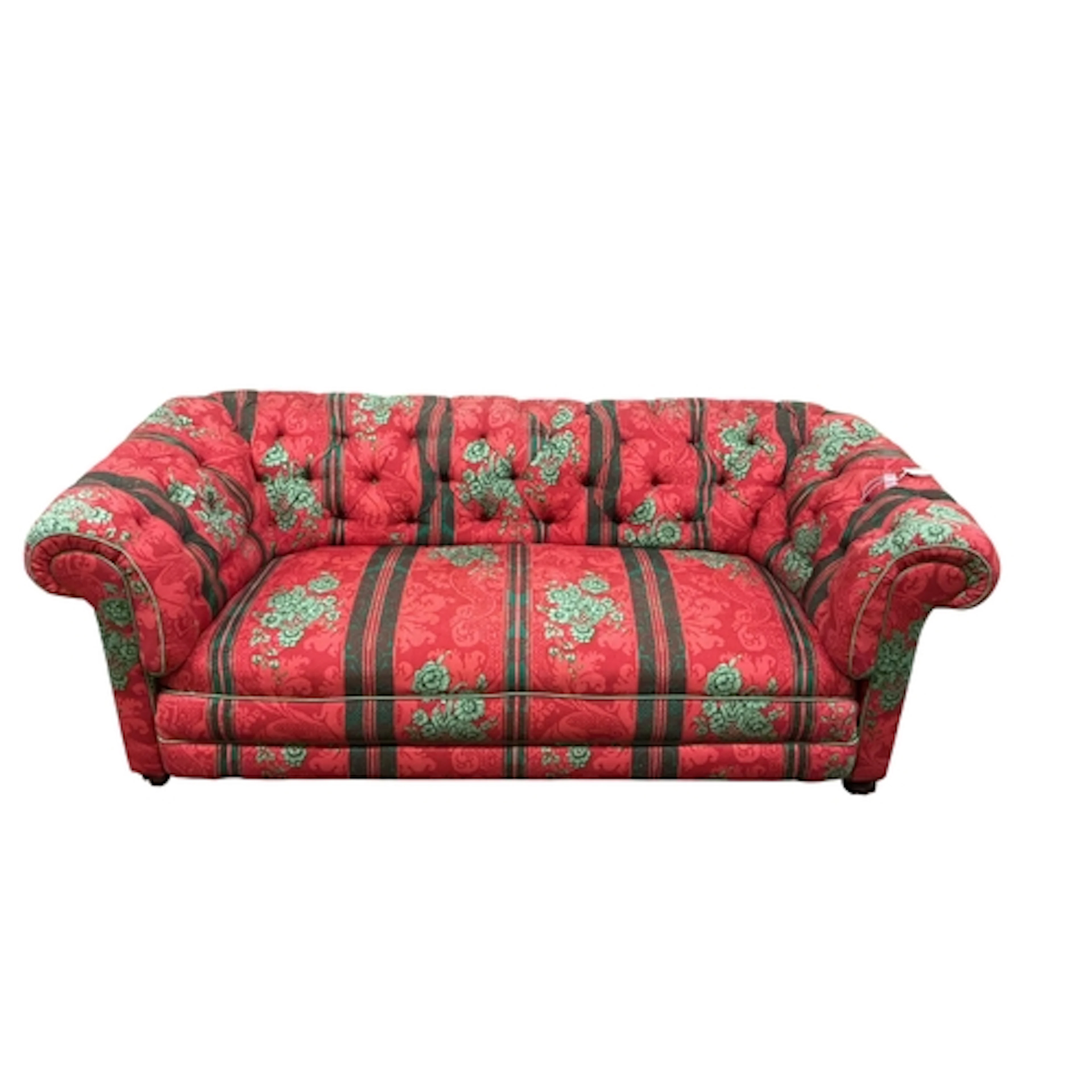 An early 20th century Chesterfield settee upholstered in but...