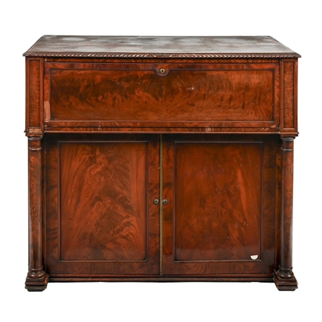 A George IV mahogany secretaire press, with gadrooned lip an...