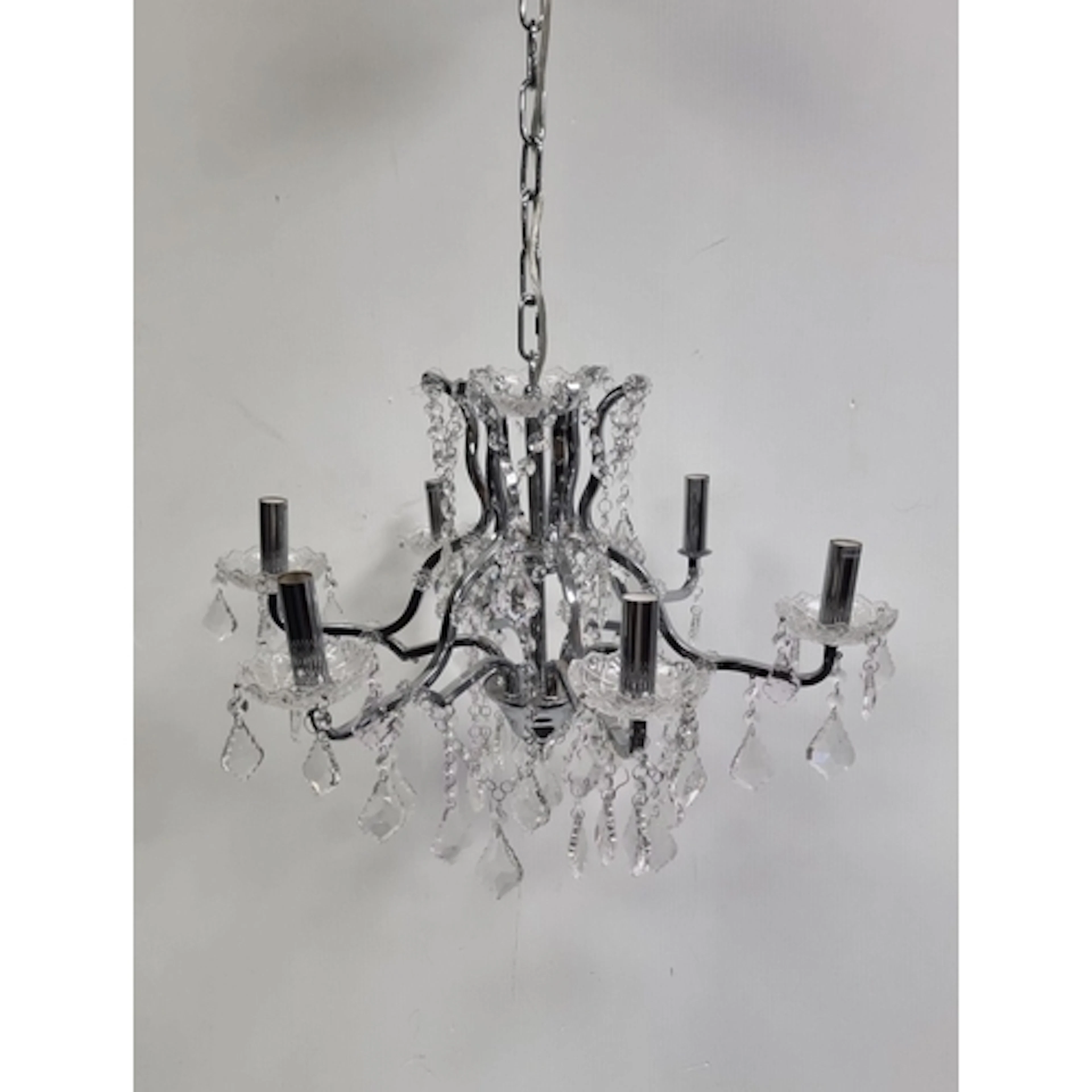 Chrome and crystal five-light chandelier, H: 32cm.