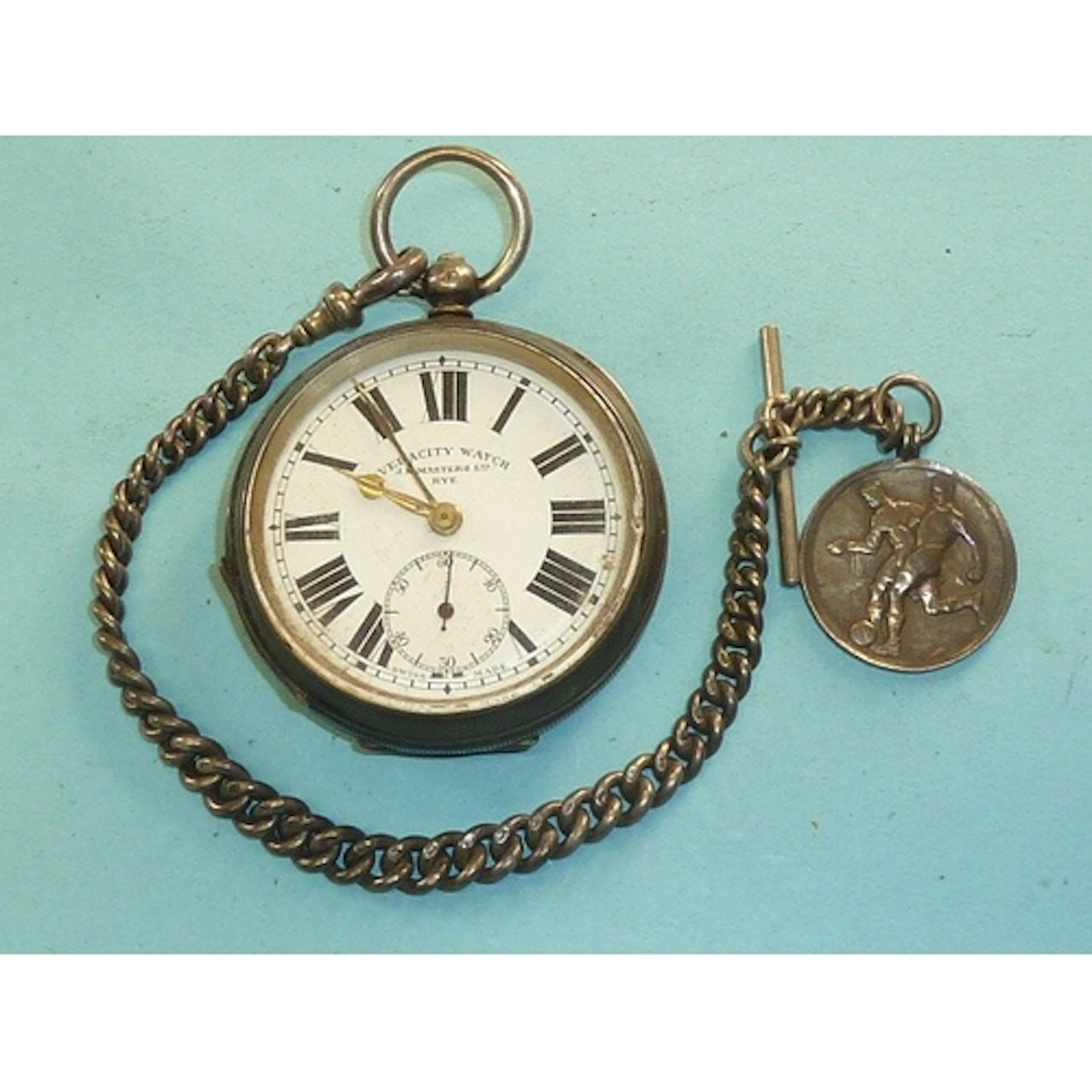 A silver cased keywind pocket watch marked "Veracity Watch, ...