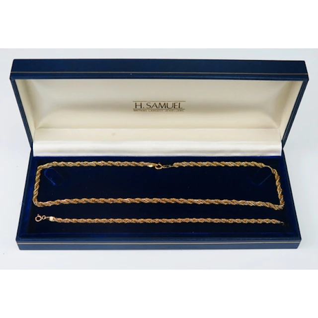 A 9ct yellow gold rope twist and white box link entwined nec...