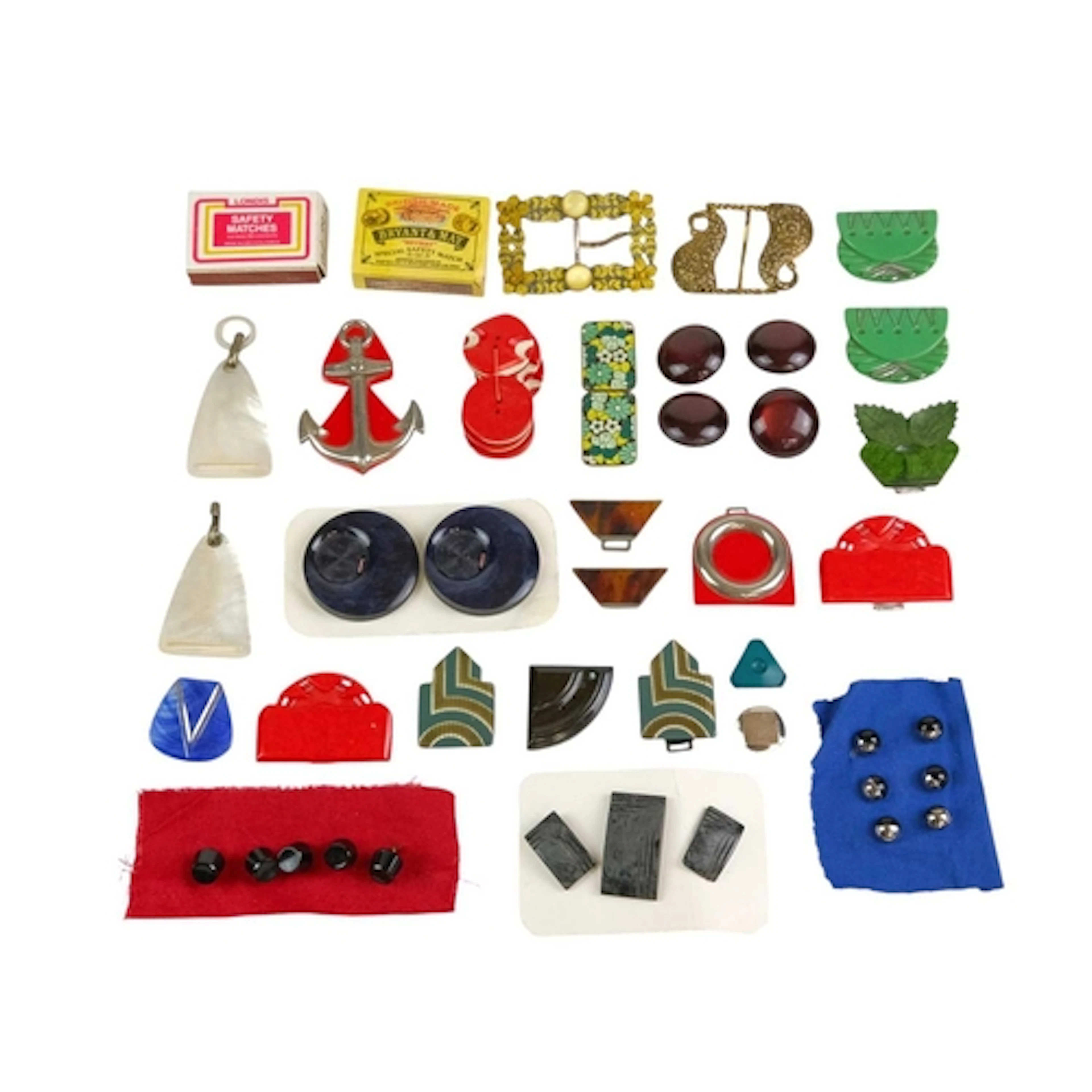 A collection of mid-century buttons and buckles. Including s...