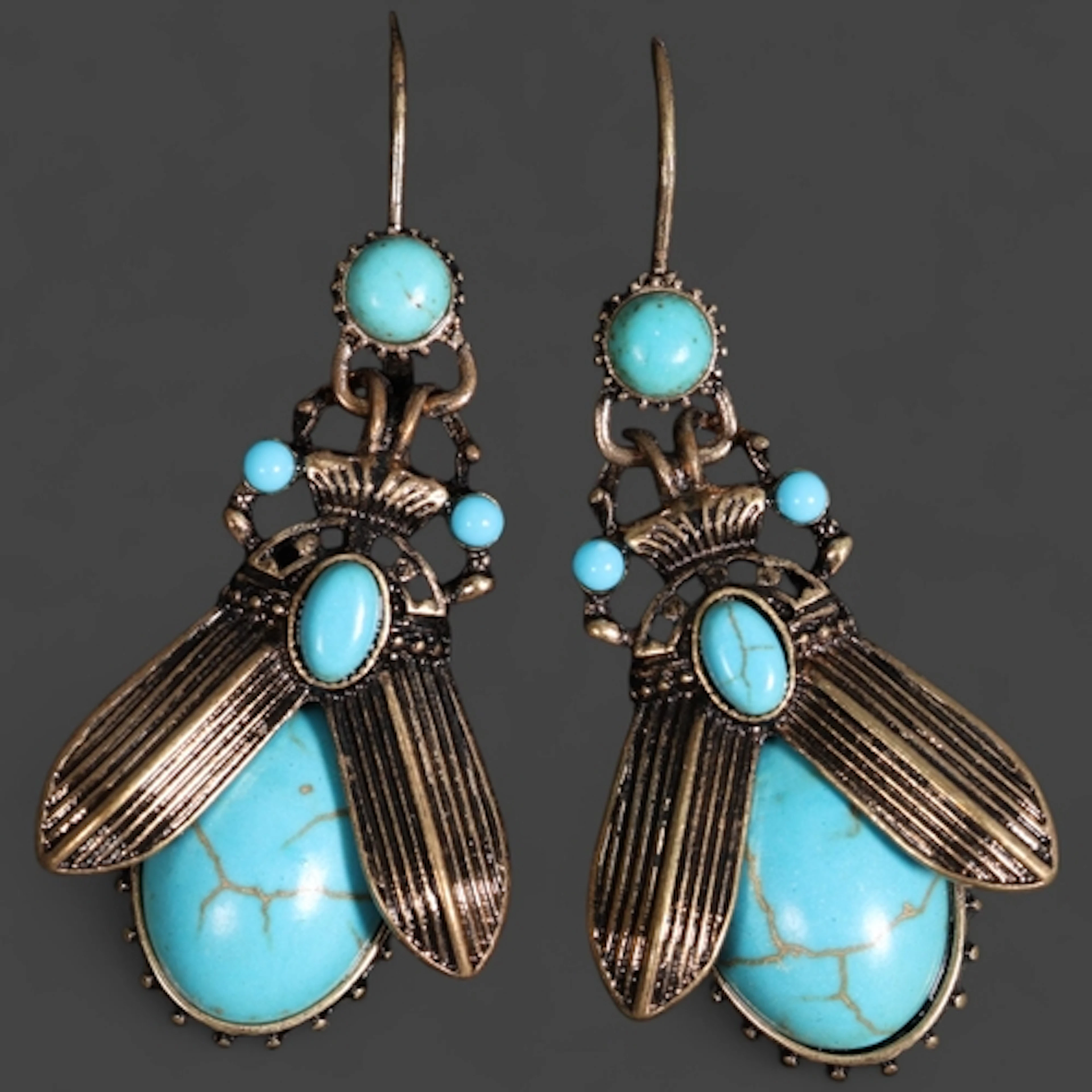 Jewellery: Alexander McQueen style costume jewellery earring...