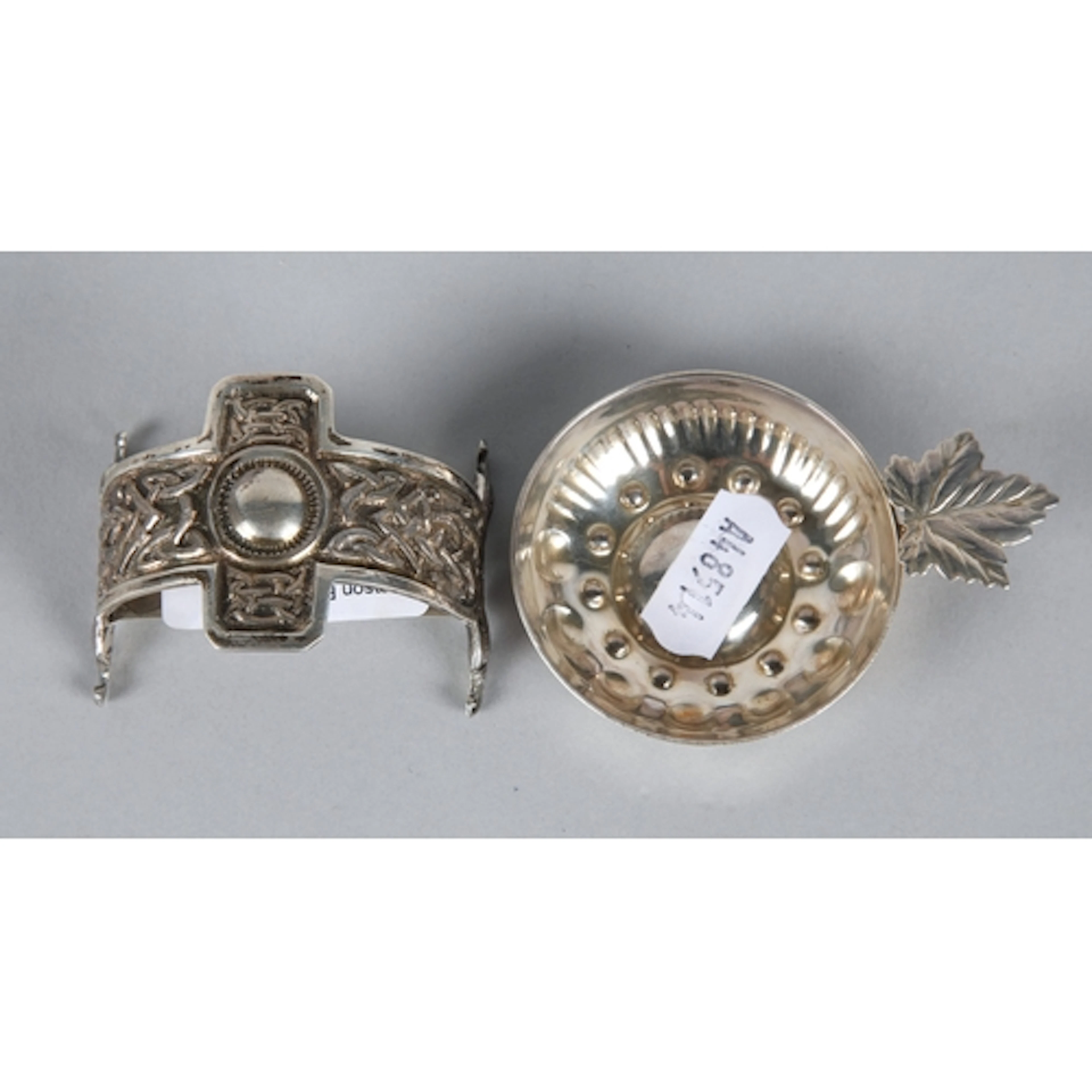 Silver Celtic style napkin ring, Glasgow 1910, and a French...