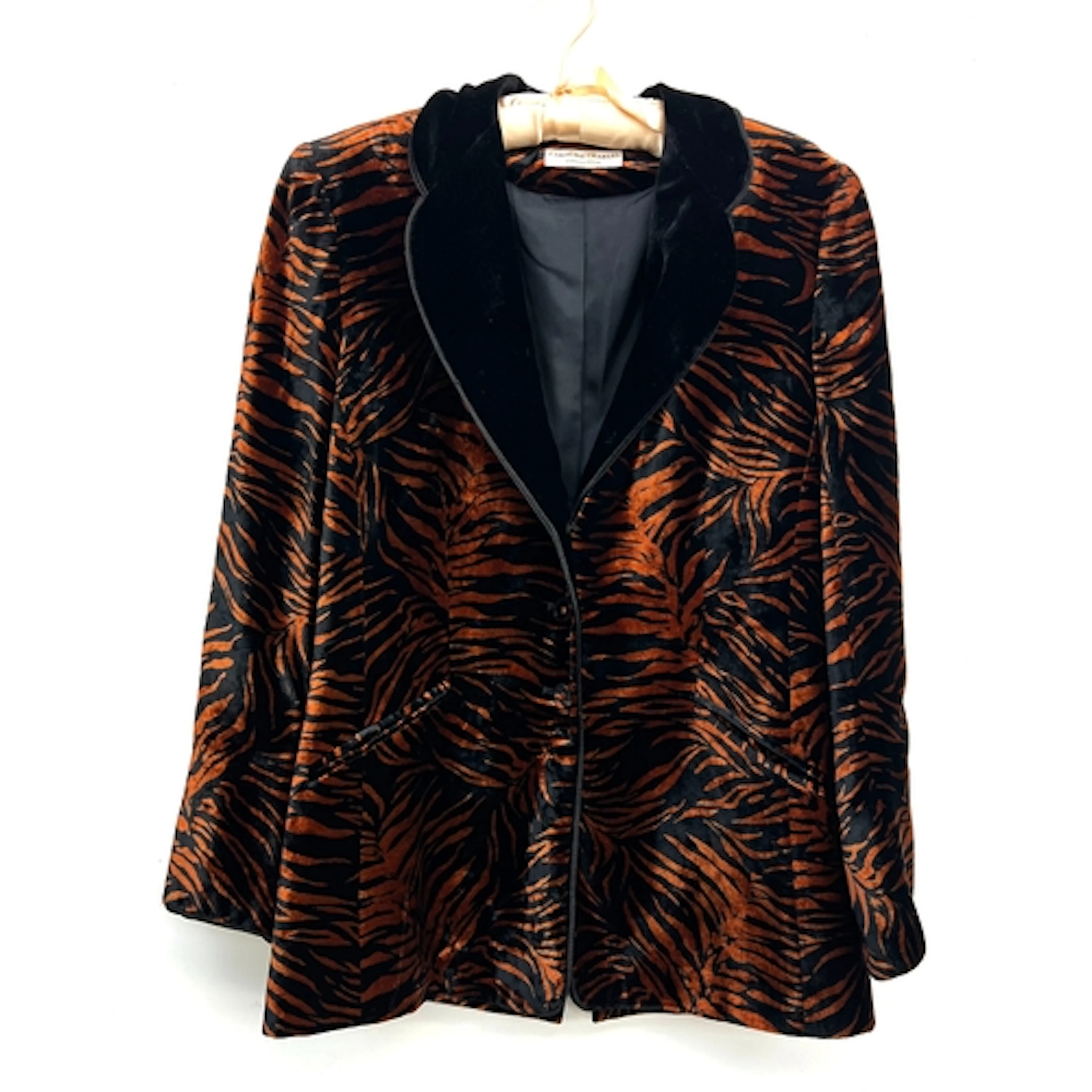 A Diane Freis silk two piece jacket and skirt in a leopard s...