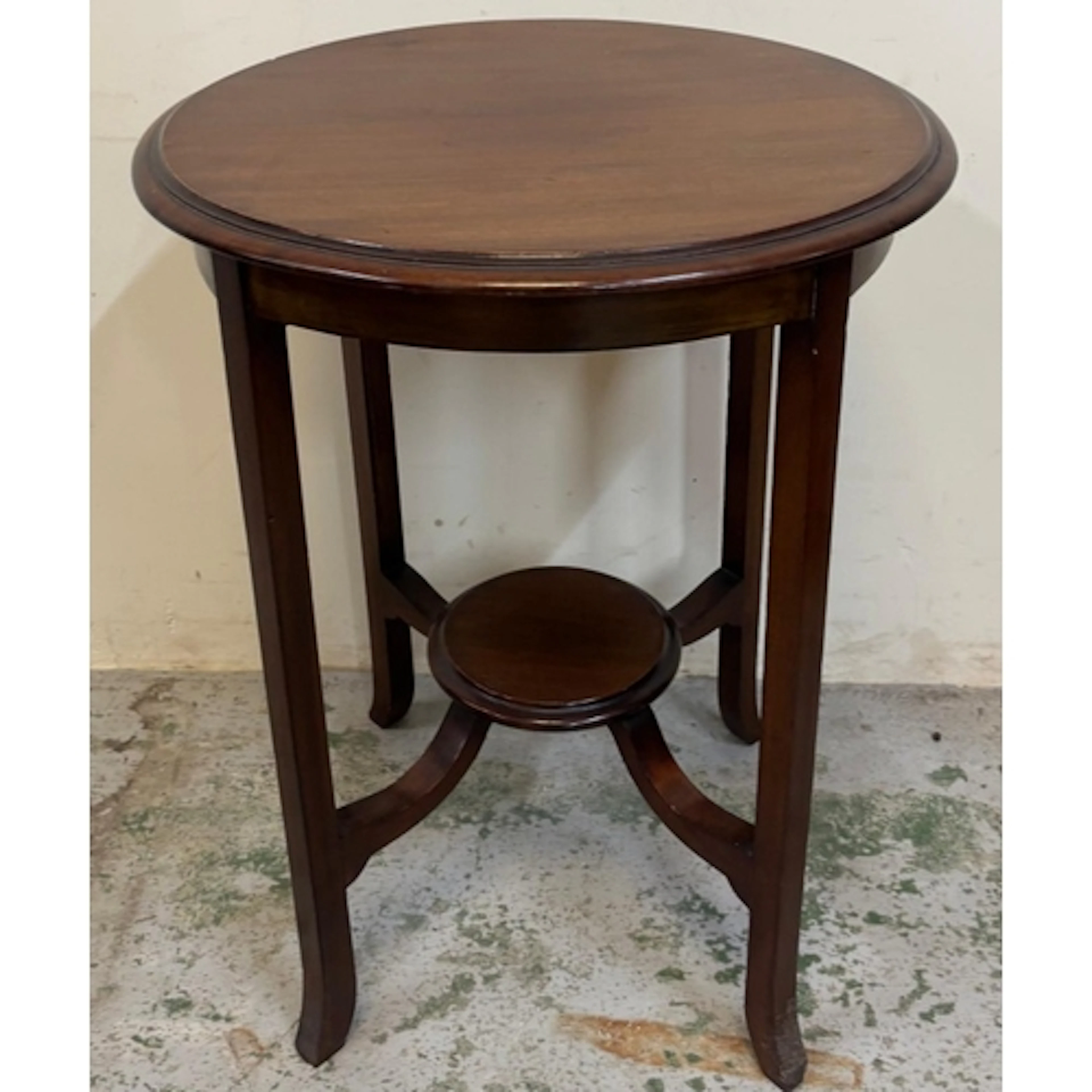A mahogany Sheraton revival occasional table on tapering leg...