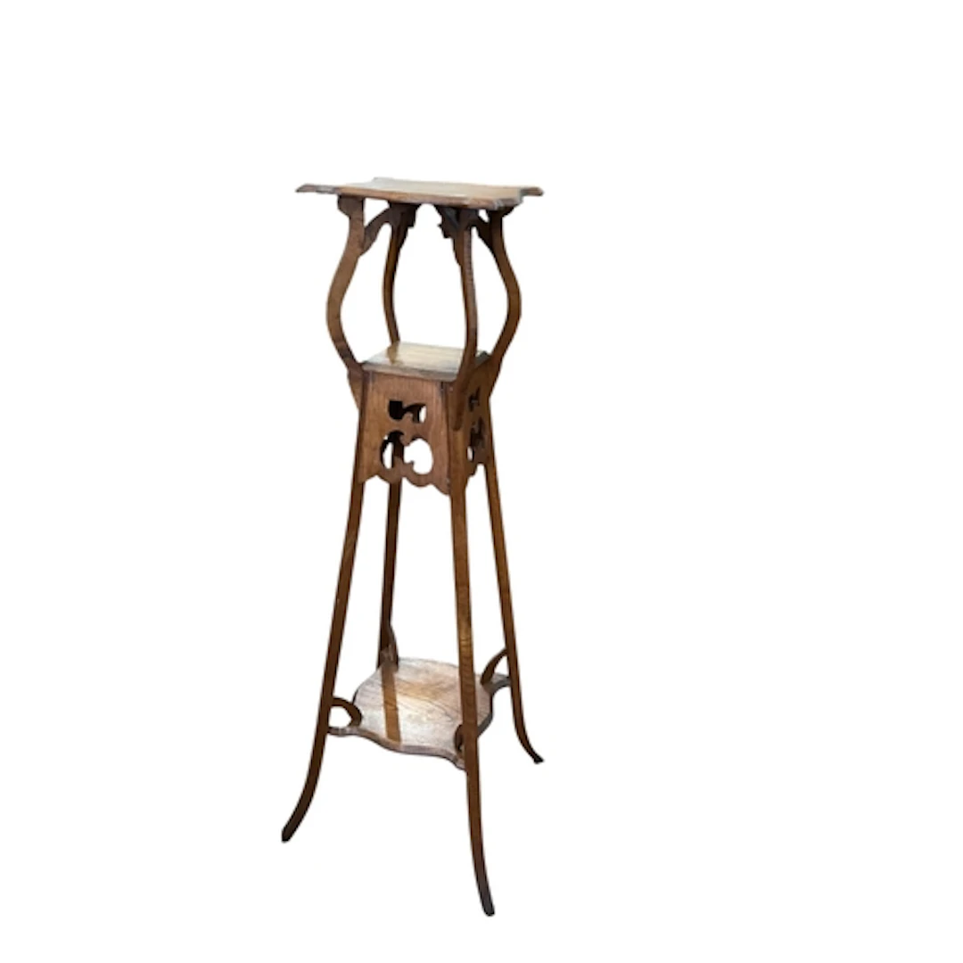 An Art Nouveau oak plant stand, width 41cm, depth 45cm, heig...