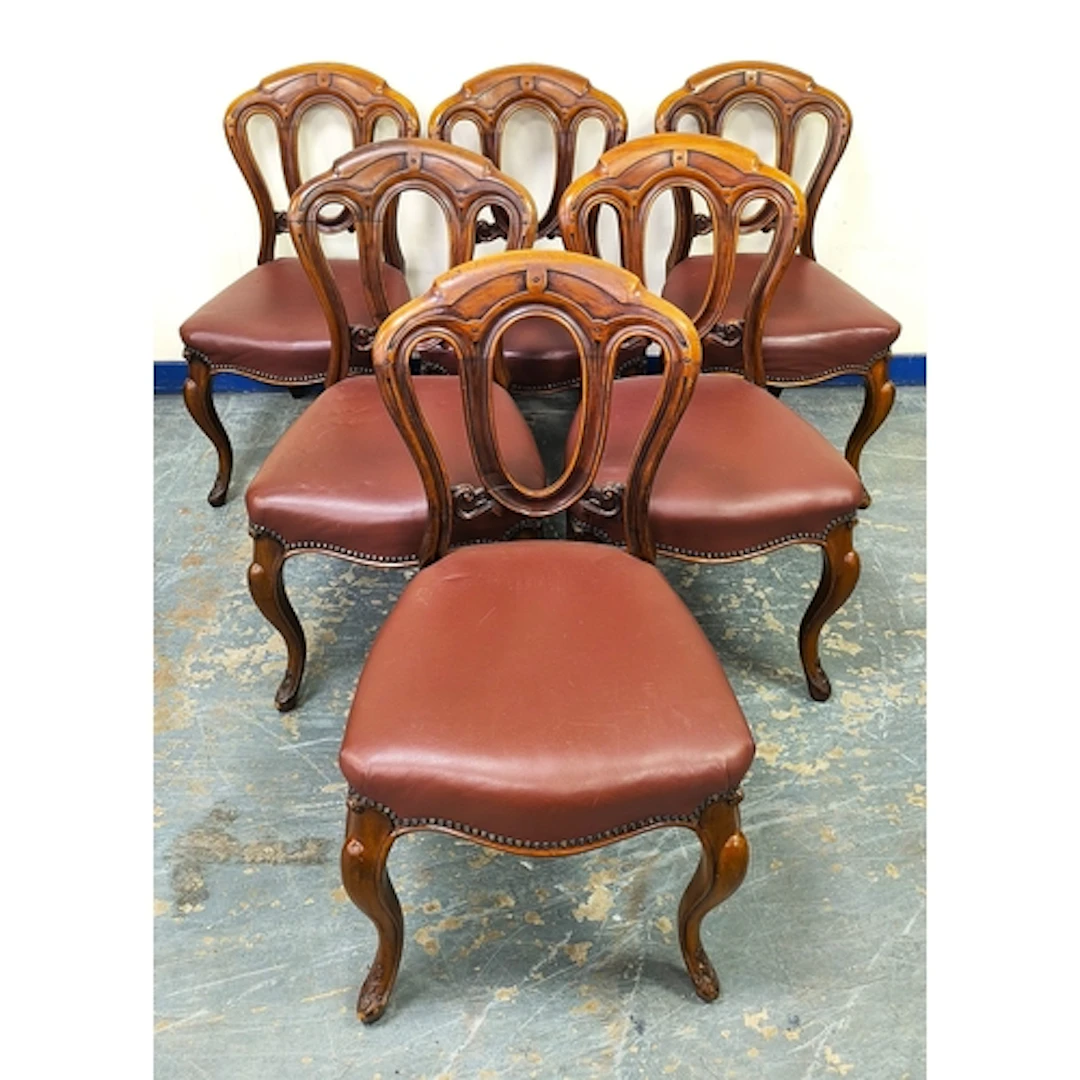 Set of six Victorian walnut dining chairs with Gothic themed...