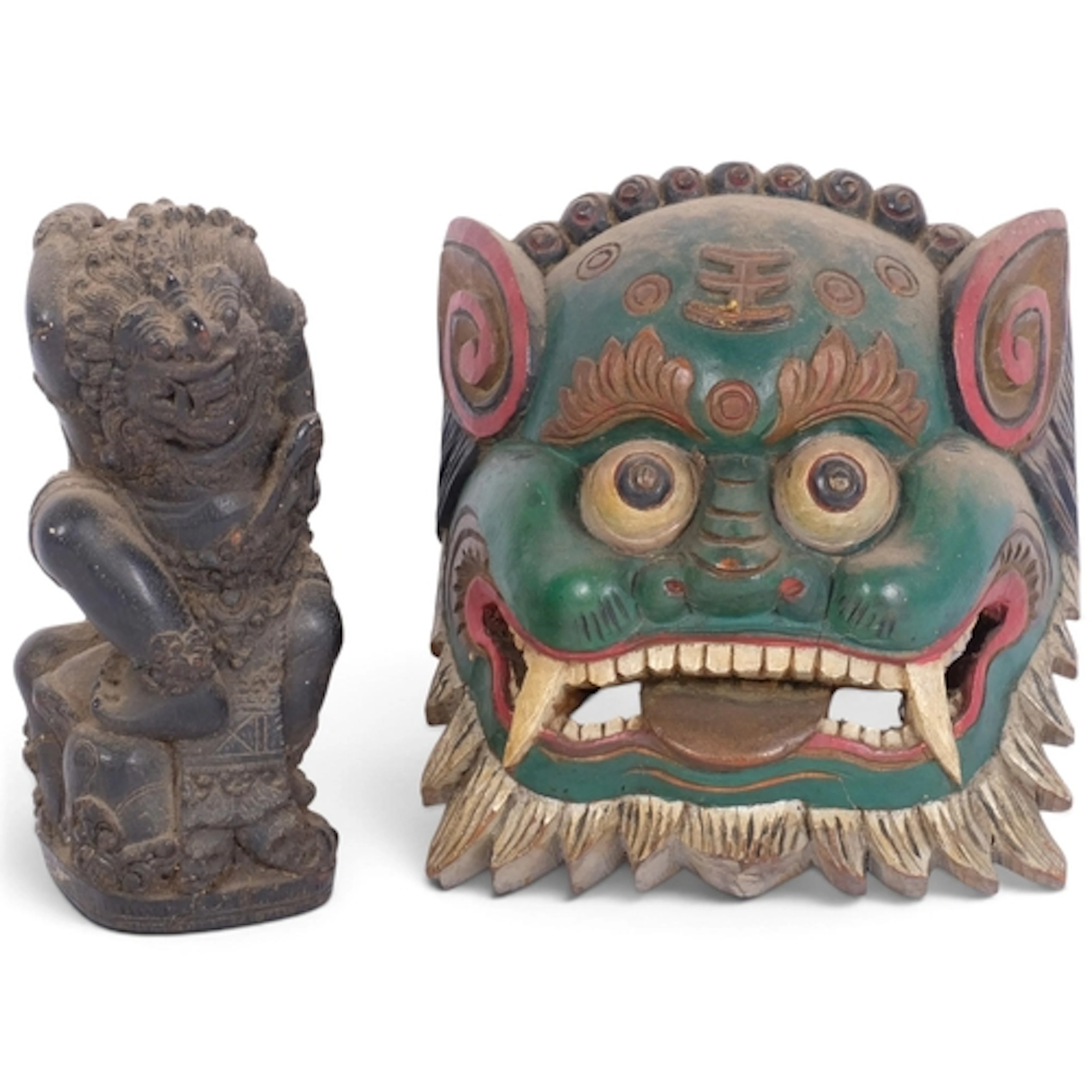 A carved and painted wood dragon war mask, H18cm, and a Burm...