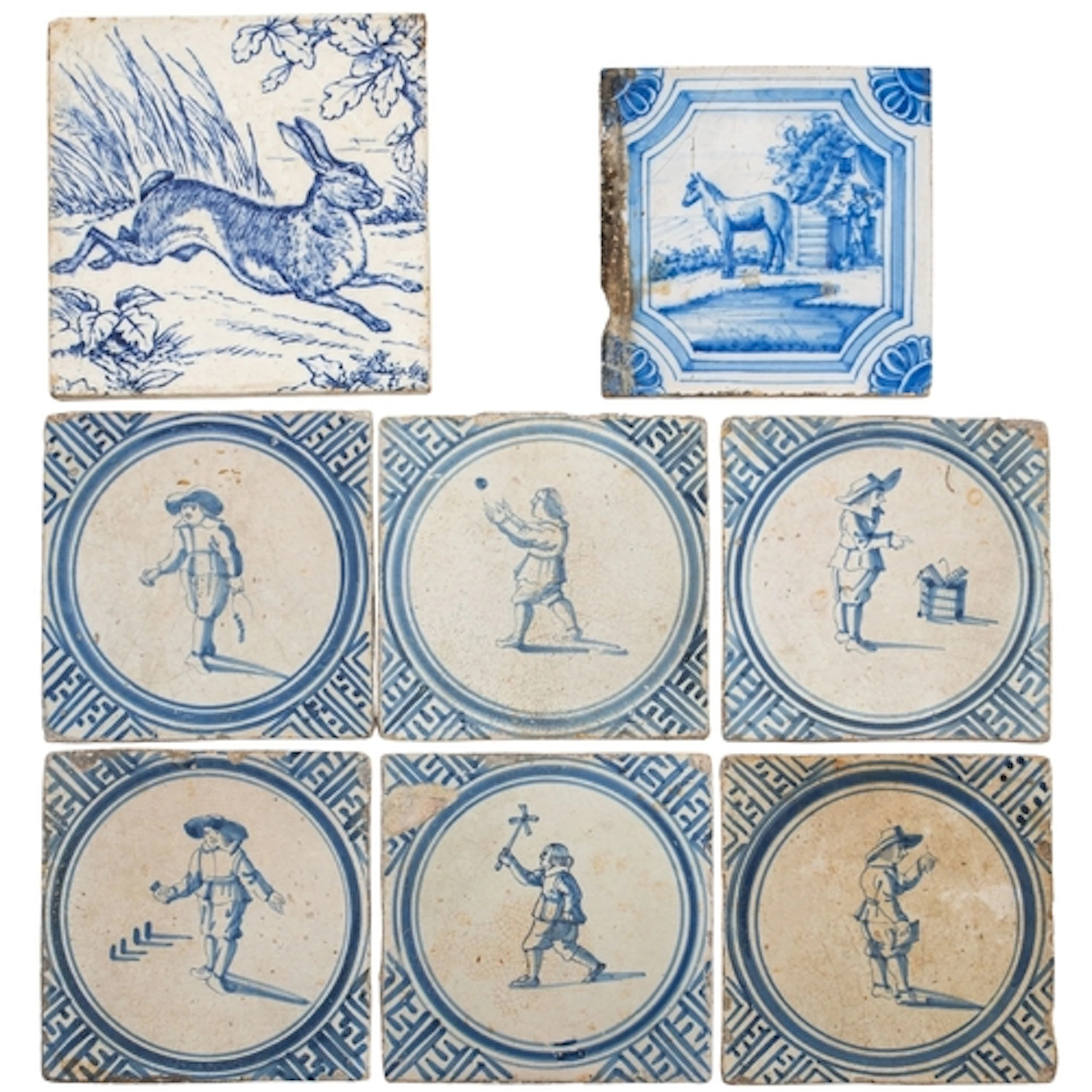 A group of six Dutch Delft tiles each painted in blue with a...