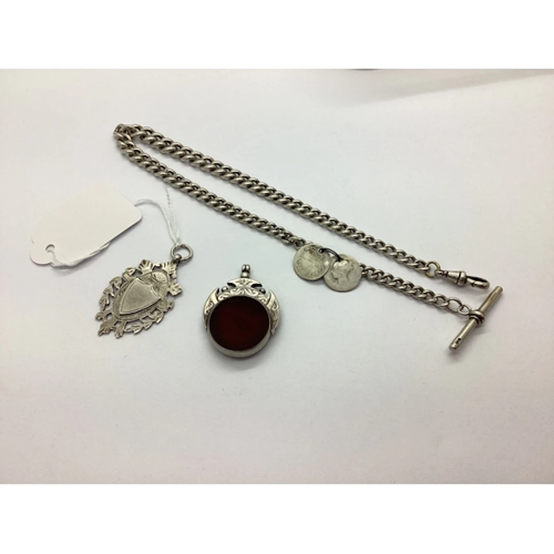 A Hallmarked Silver Curb Link Watch Chain, of graduated desi...