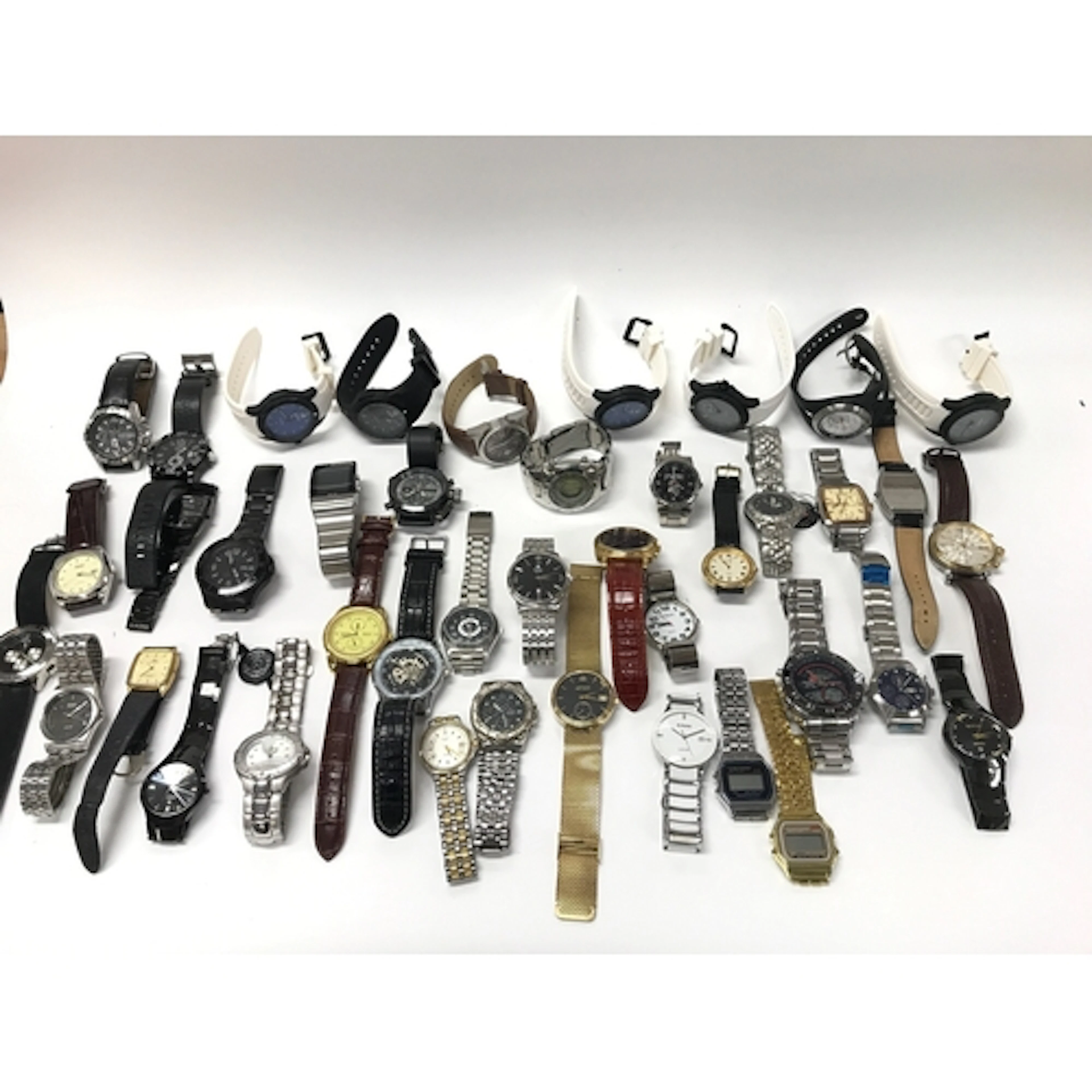 A large collection of assorted fashion watches including Rad...