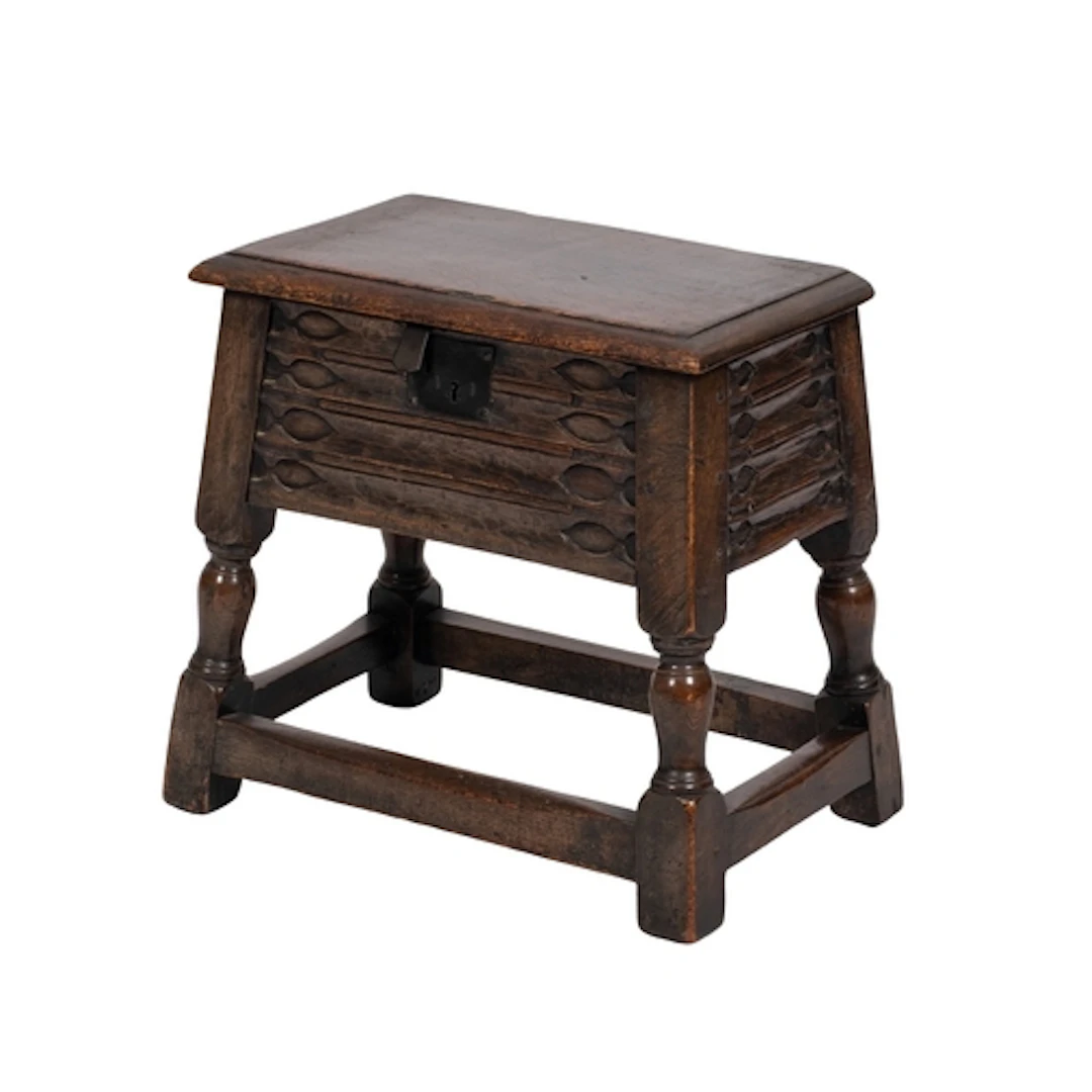 An oak box stool in 17th century style, late 19th century; t...