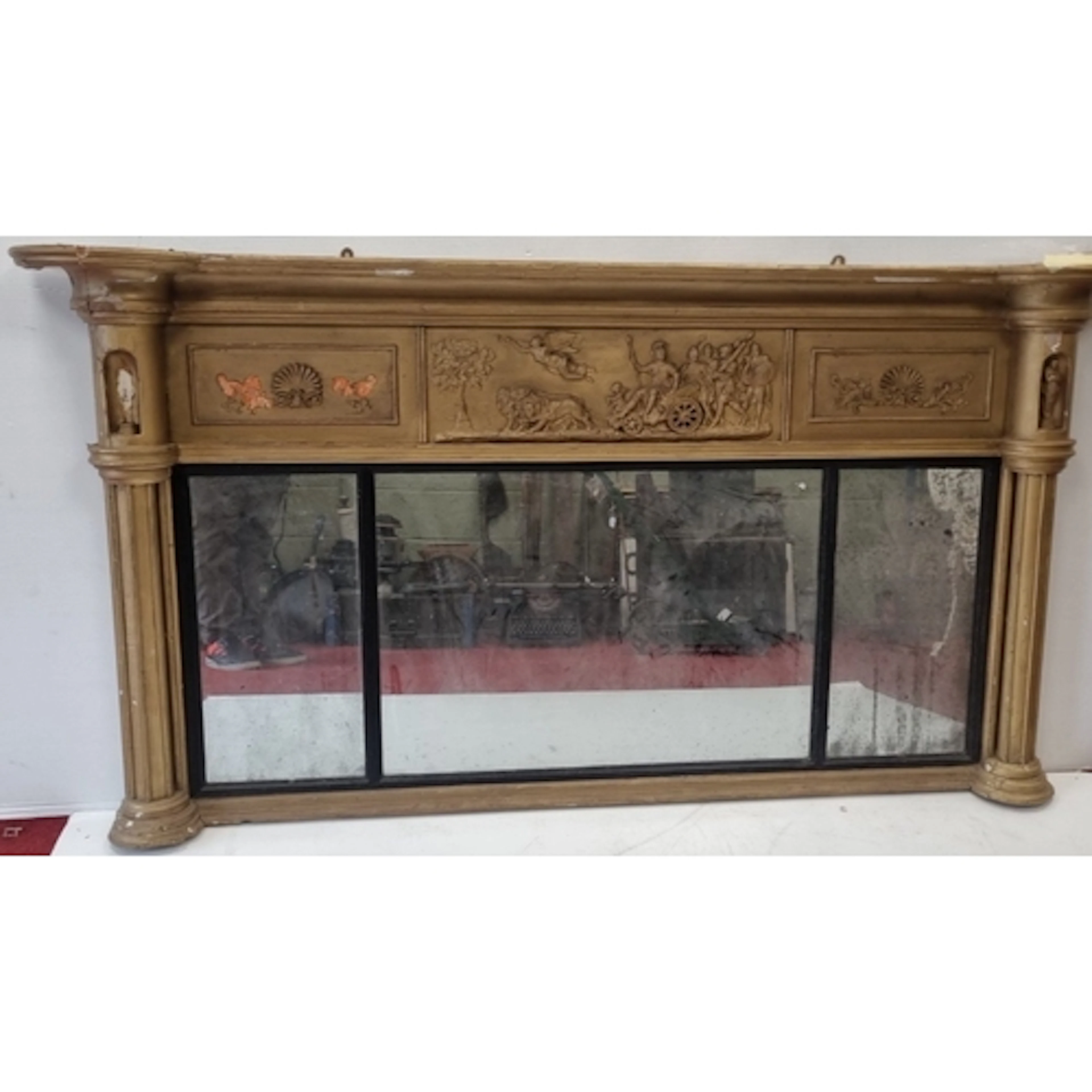Large gilt overmantel mirror with classical relief decoratio...