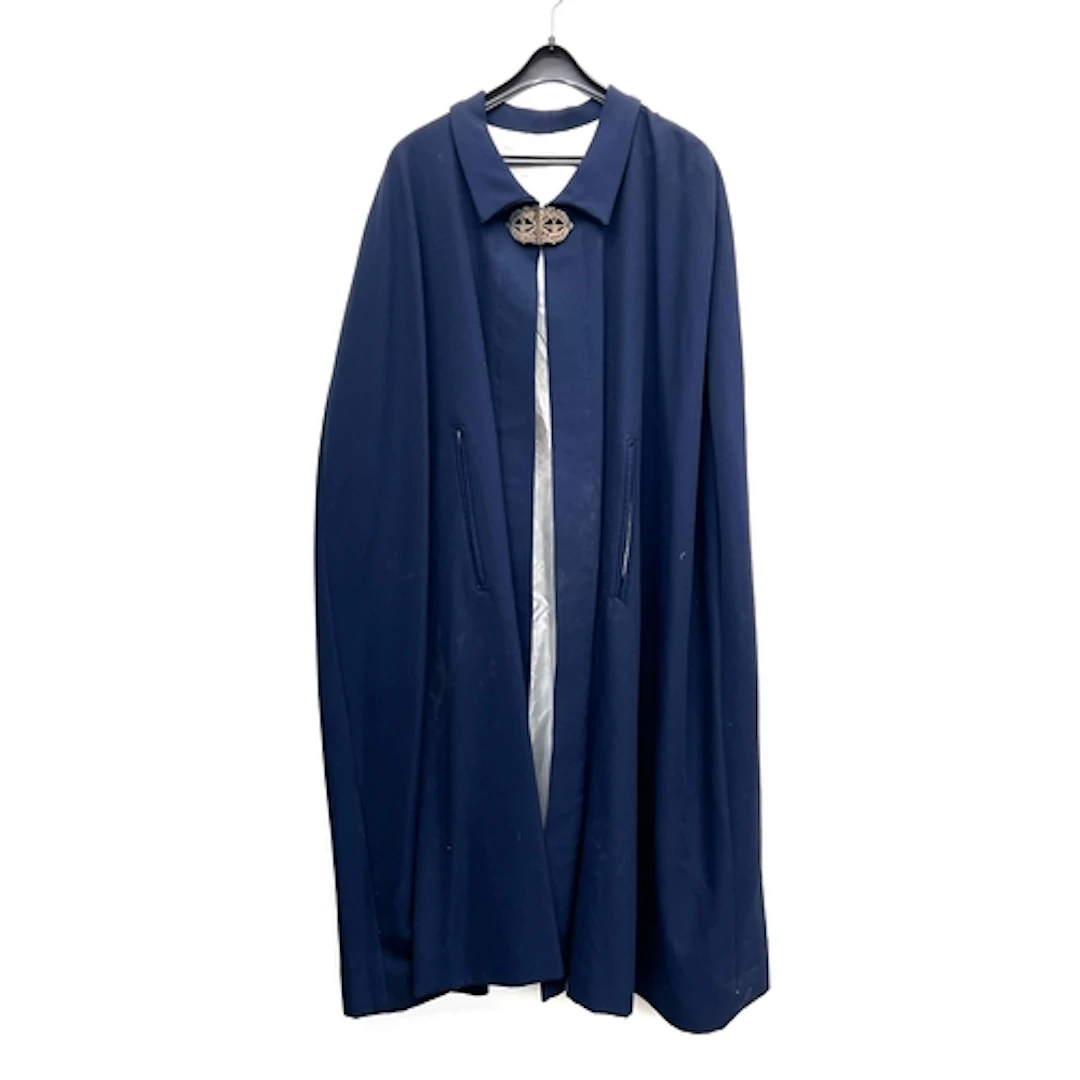 A navy nurse's cape with sterling silver buckle with pierced...