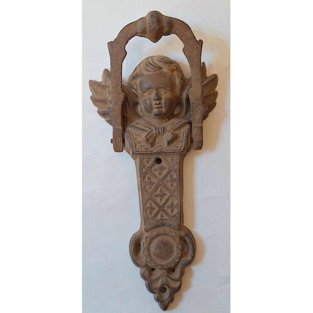 Cast Iron Door Knocker in the form of a cherub/angel approx....