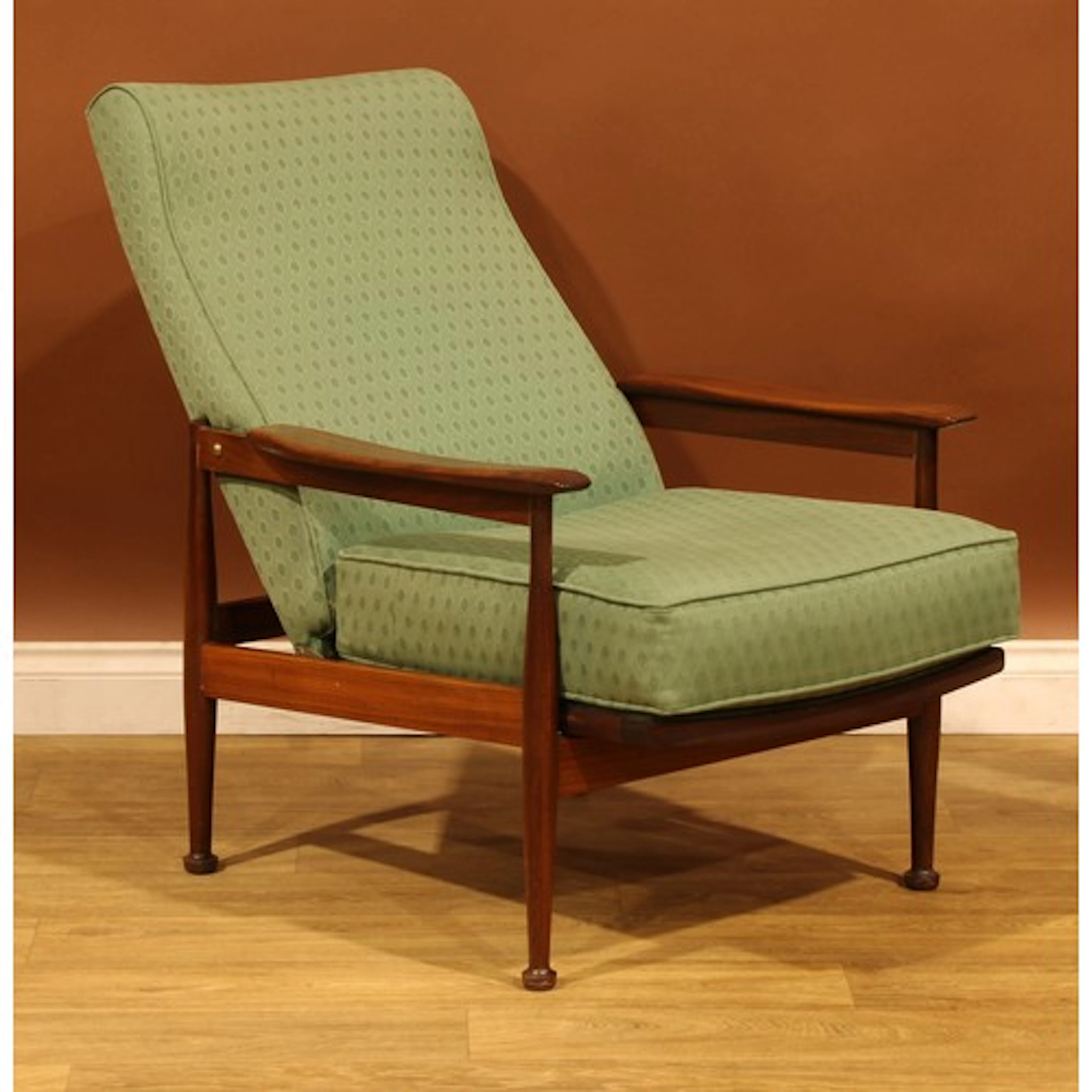 Mid-century Design - an afrormosia Manhattan chair, designed...