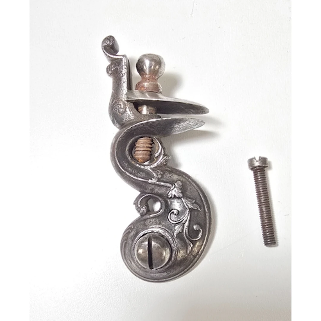 A large detached Italian flintlock cock from a sporting gun ...